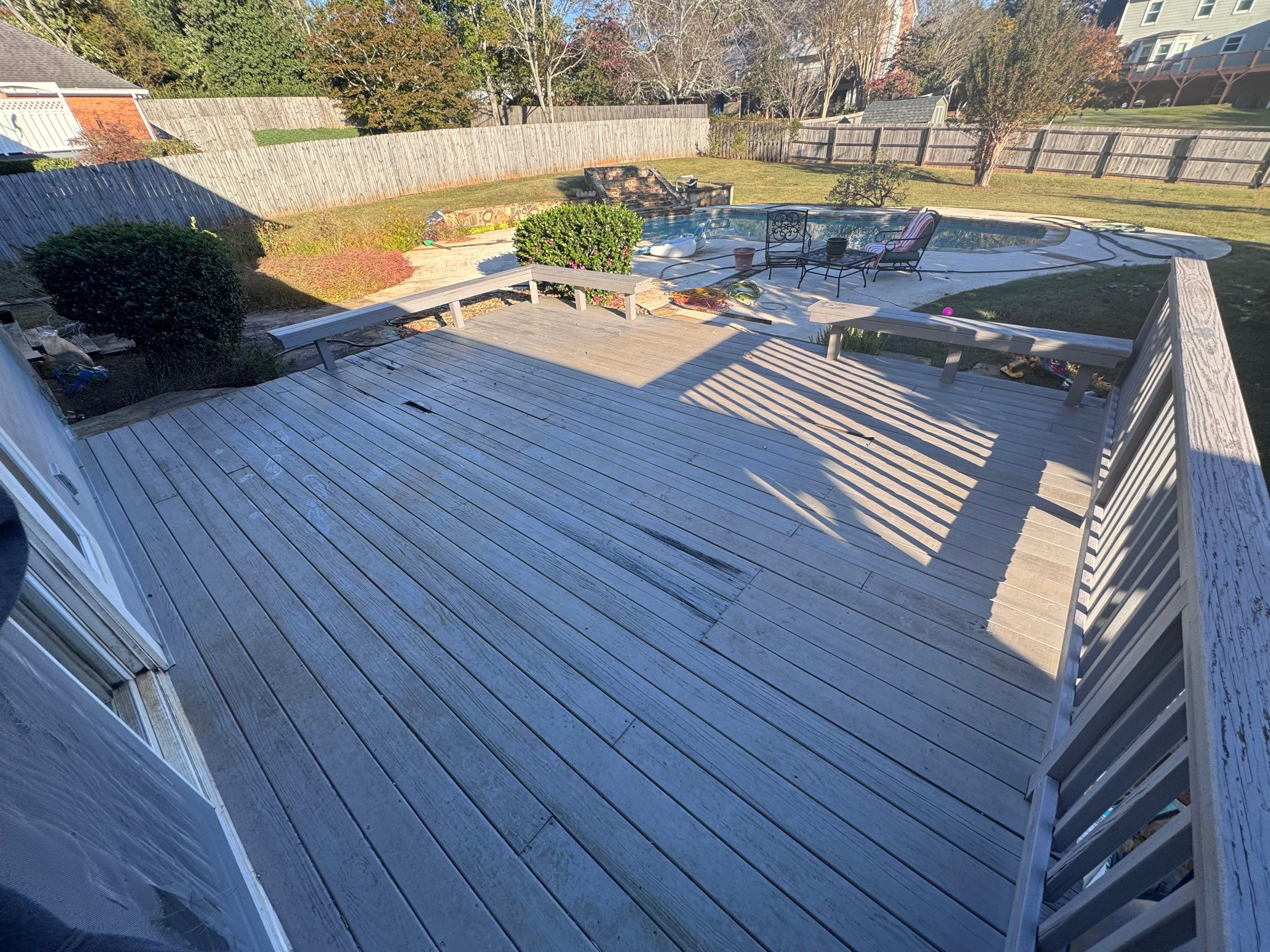 Custom Composite Deck with Integrated Seating in Roswell by Swift Home Renovations
