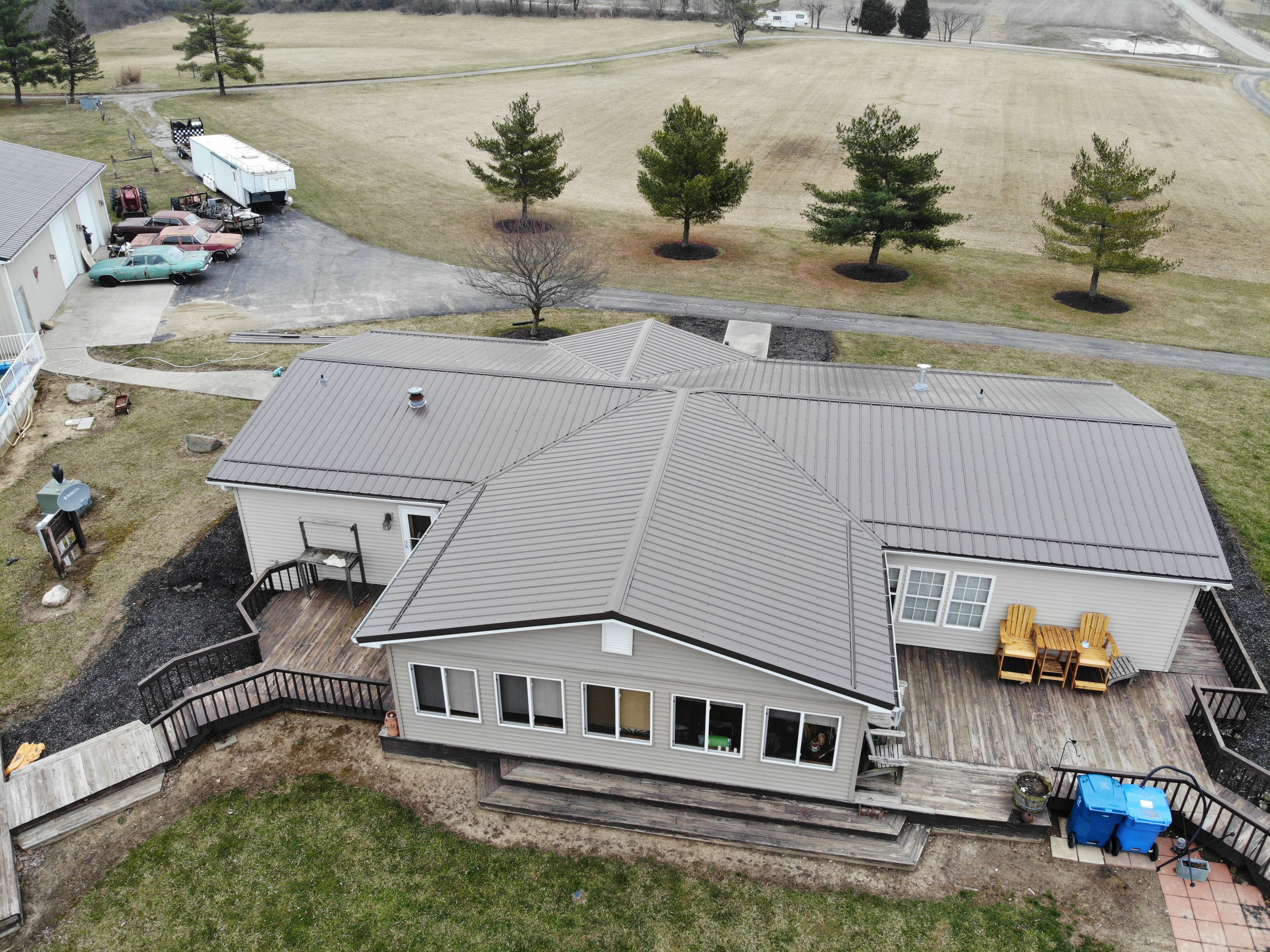Exposed Fastener Metal Roof on Multi-Home Property in Columbia City, Indiana by 4Ever Metal Roofing