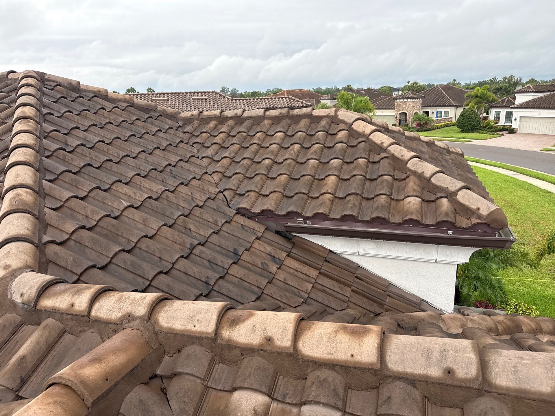 Concrete Tile Roof, Paver Driveway & Lanai Cleaning – Artisan Lakes Esplanade, Palmetto, FL by Sunshine AquaWash