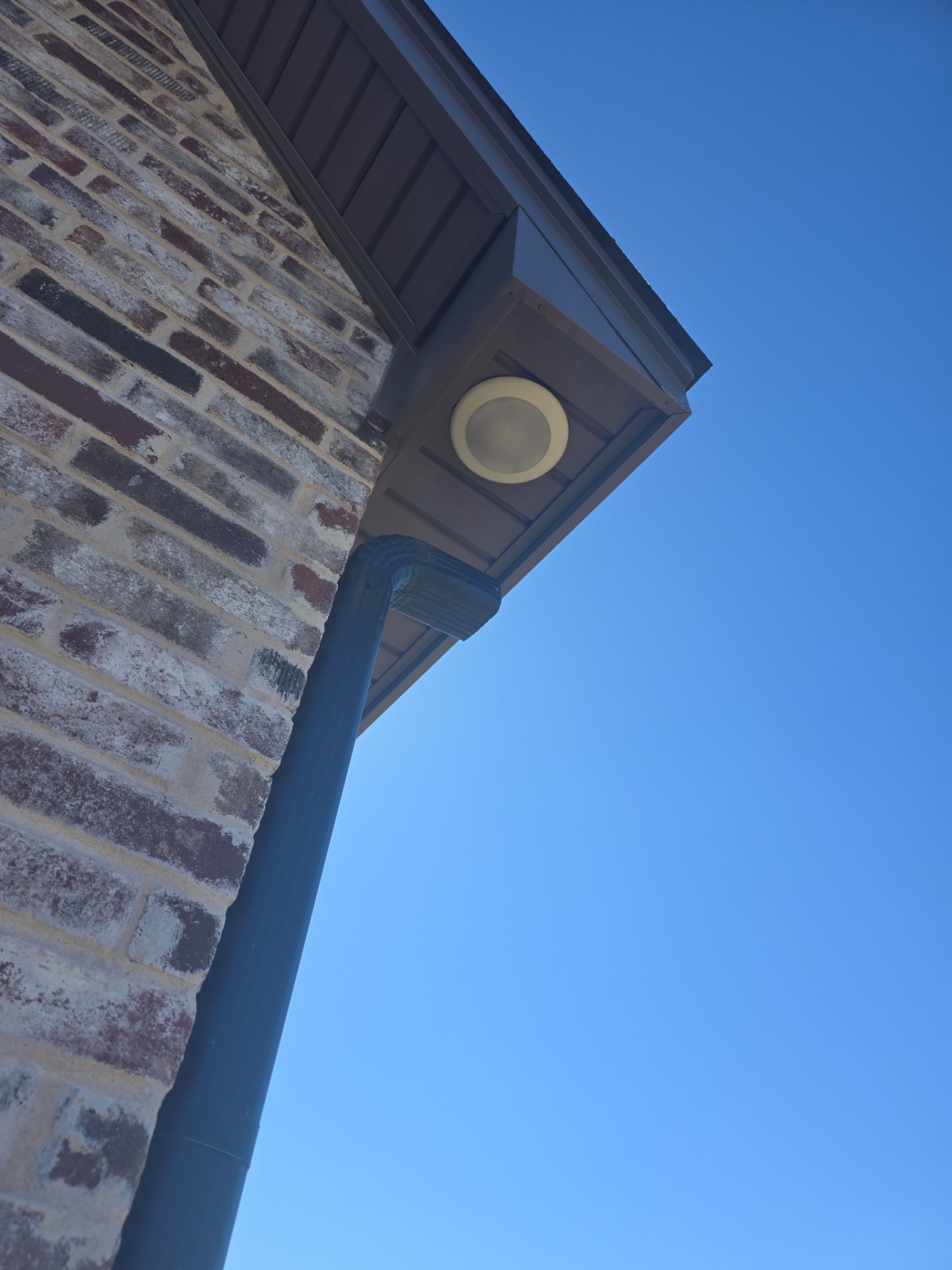 Fascia and door frames wrapped with PVC coil & soffit installation by In & Out Construction & Remodeling, LLC