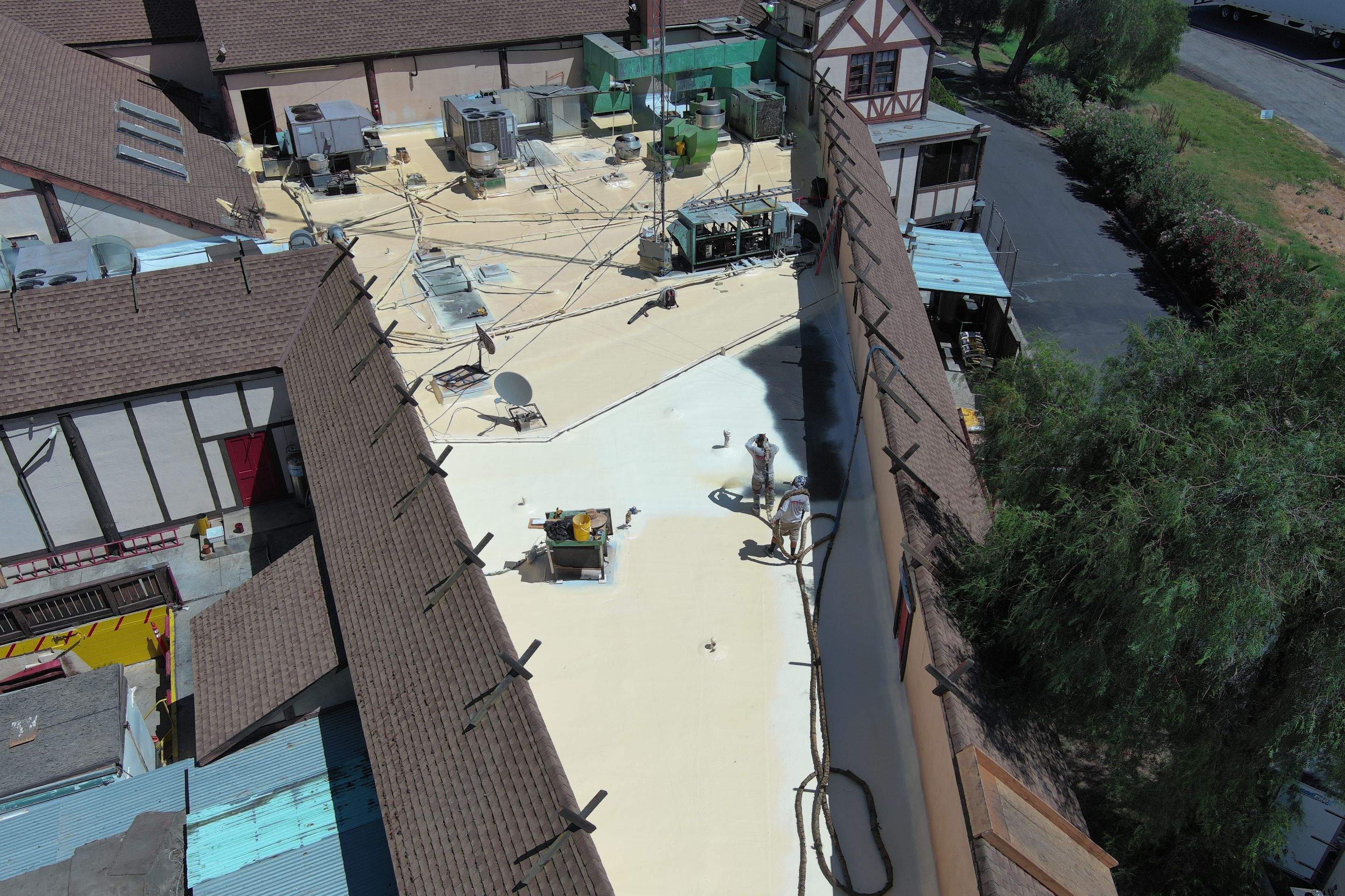 Spray foam and coatings using General Coatings acrylic coatings and spray foam by Straight Edge Roofing Inc