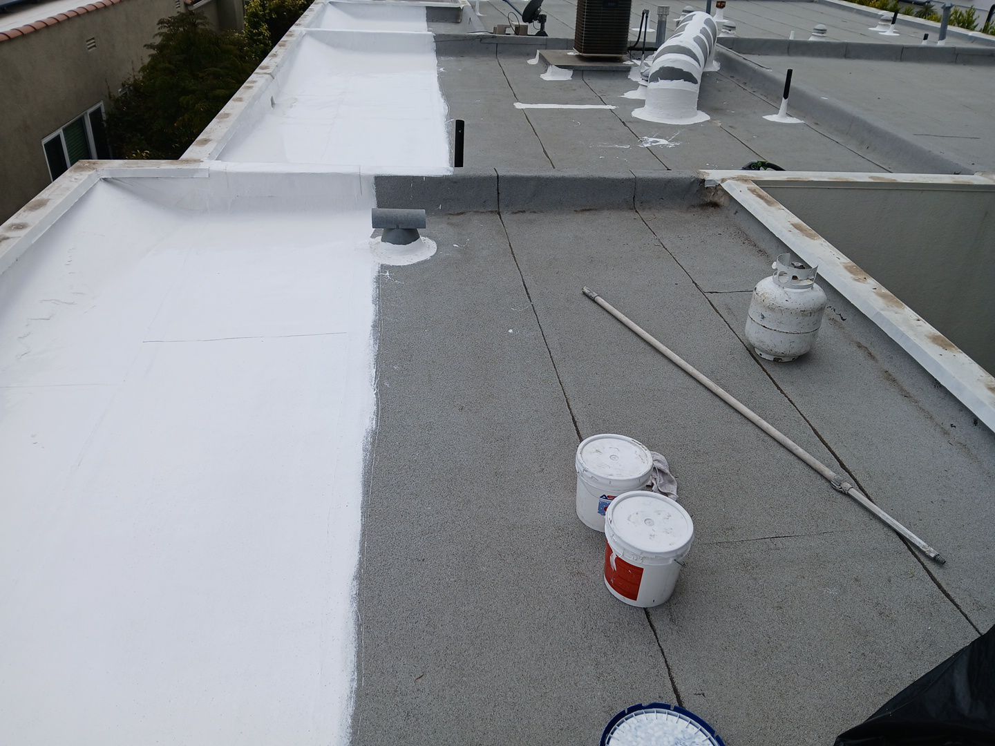 Silicone Membrane Installation using American Standard Coatings Silicone-S by Hull Brothers Roofing