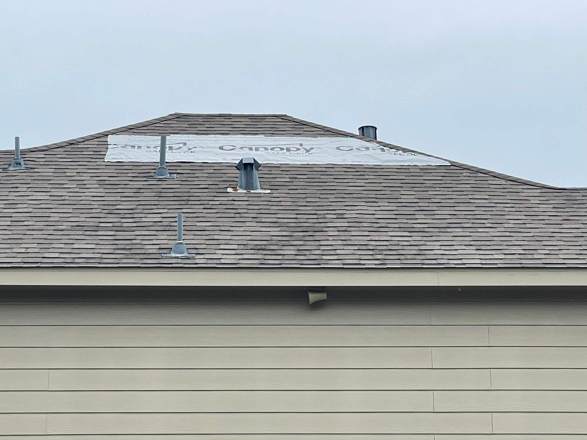 Residential Roofing Installation using Atlas Pinnacle® Pristine Shingles Weatherwood Color by CAP Roofing and Construction LLC
