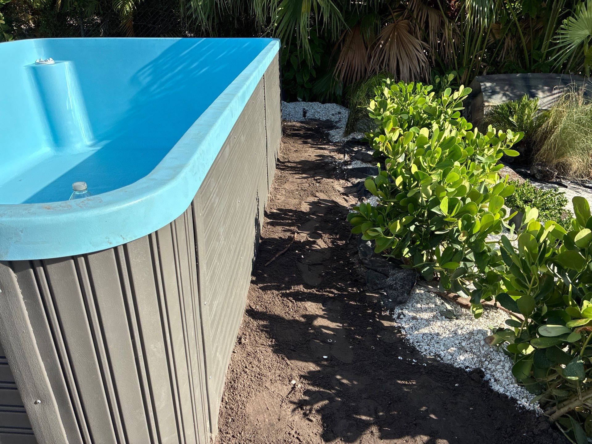 Grading back yard oasis by Level One Grading