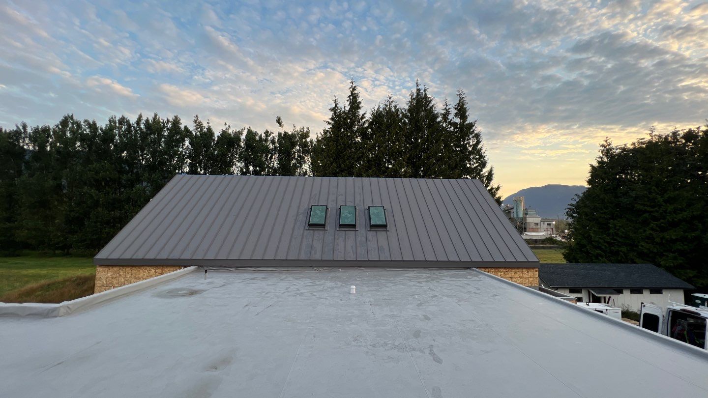 Residential Roofing Installation using multiple products by Top Notch Roofing Inc