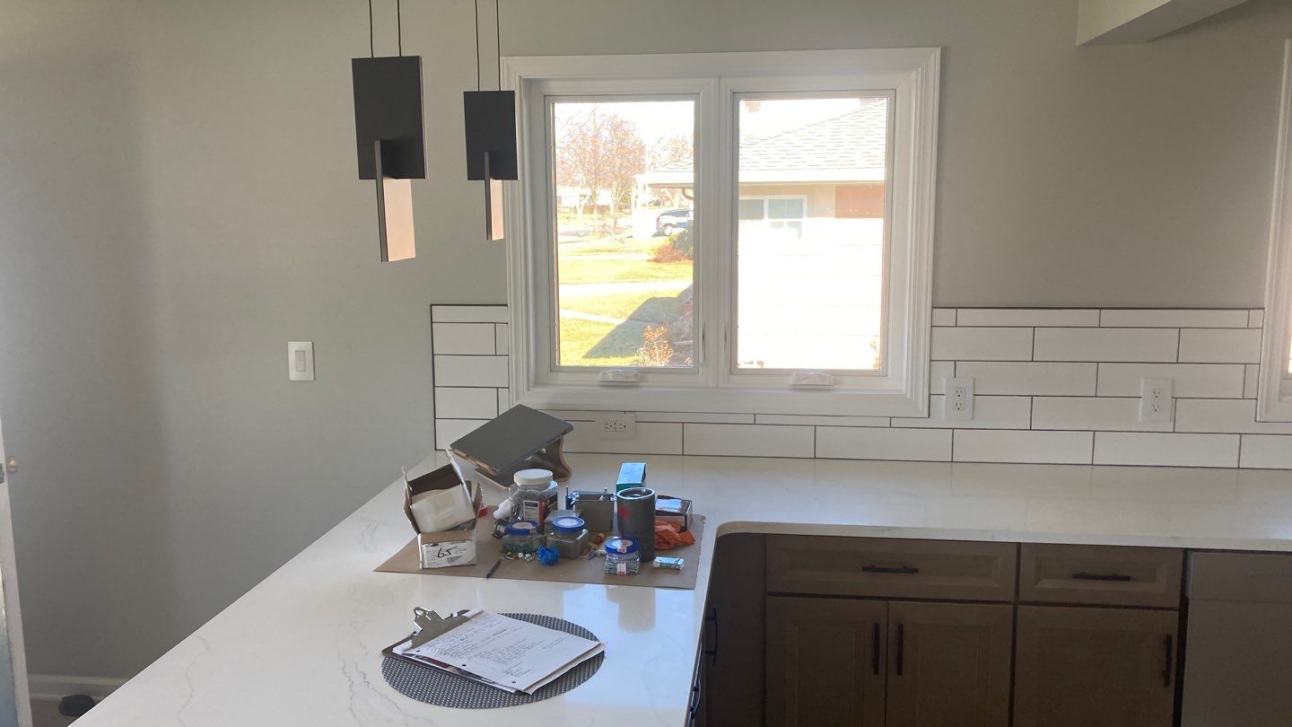 Interior Renovations, Kitchen Remodel, and Window Replacement by Ivy Lea Construction