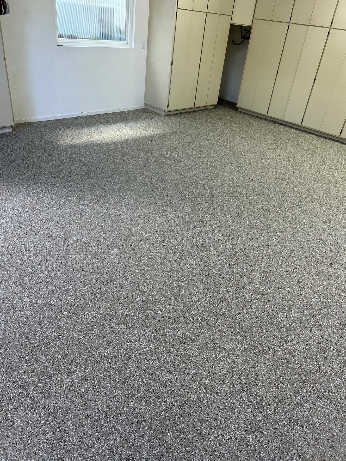 Creekbed Flake Polyurea Garage Floor Installation in Morro Bay by MGP Coatings