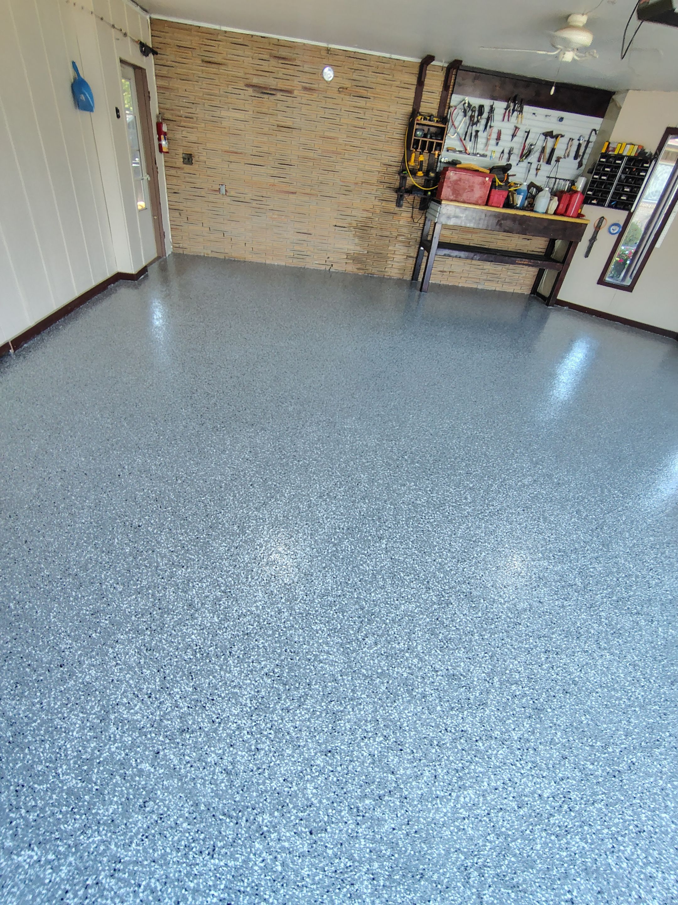 Garage Floor Coating with Crack Repair in Yankton by Select Painting, Coatings & Garage Cabinets