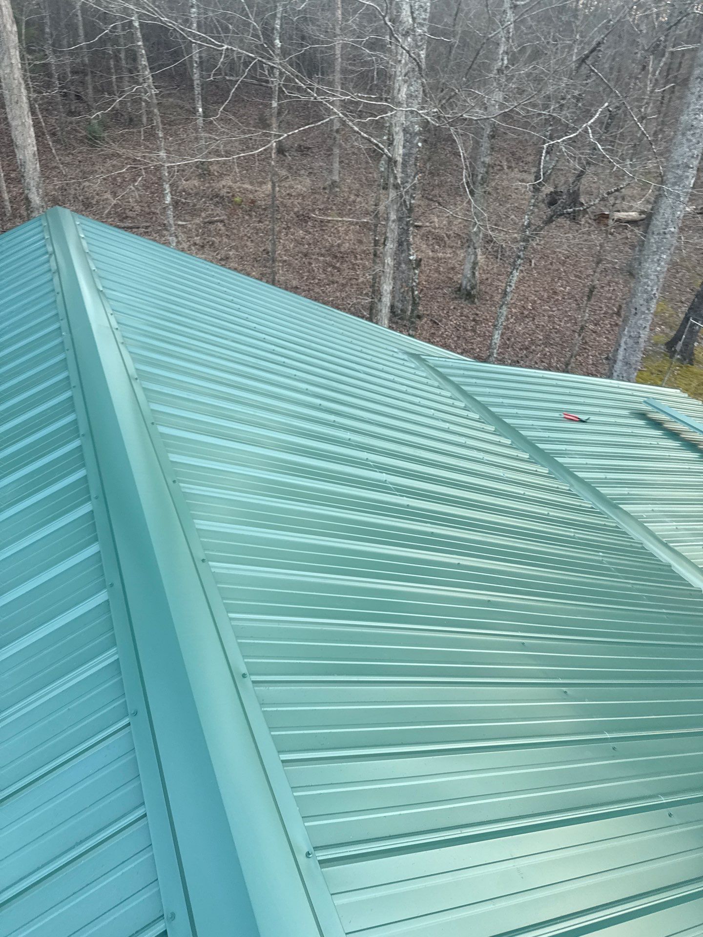 Metal Roof and Gutters Replacement in Hueytown by The Roofing Dudes