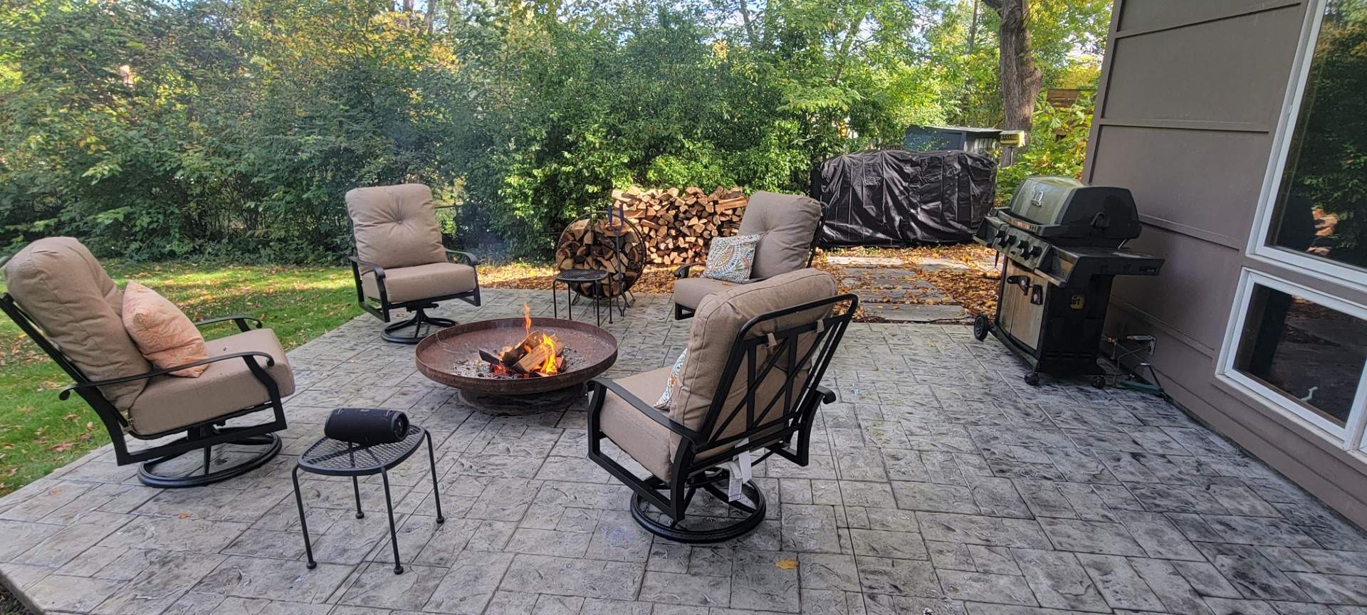 Back Yard Cantilivered Patio by LAND ESCAPES LLC