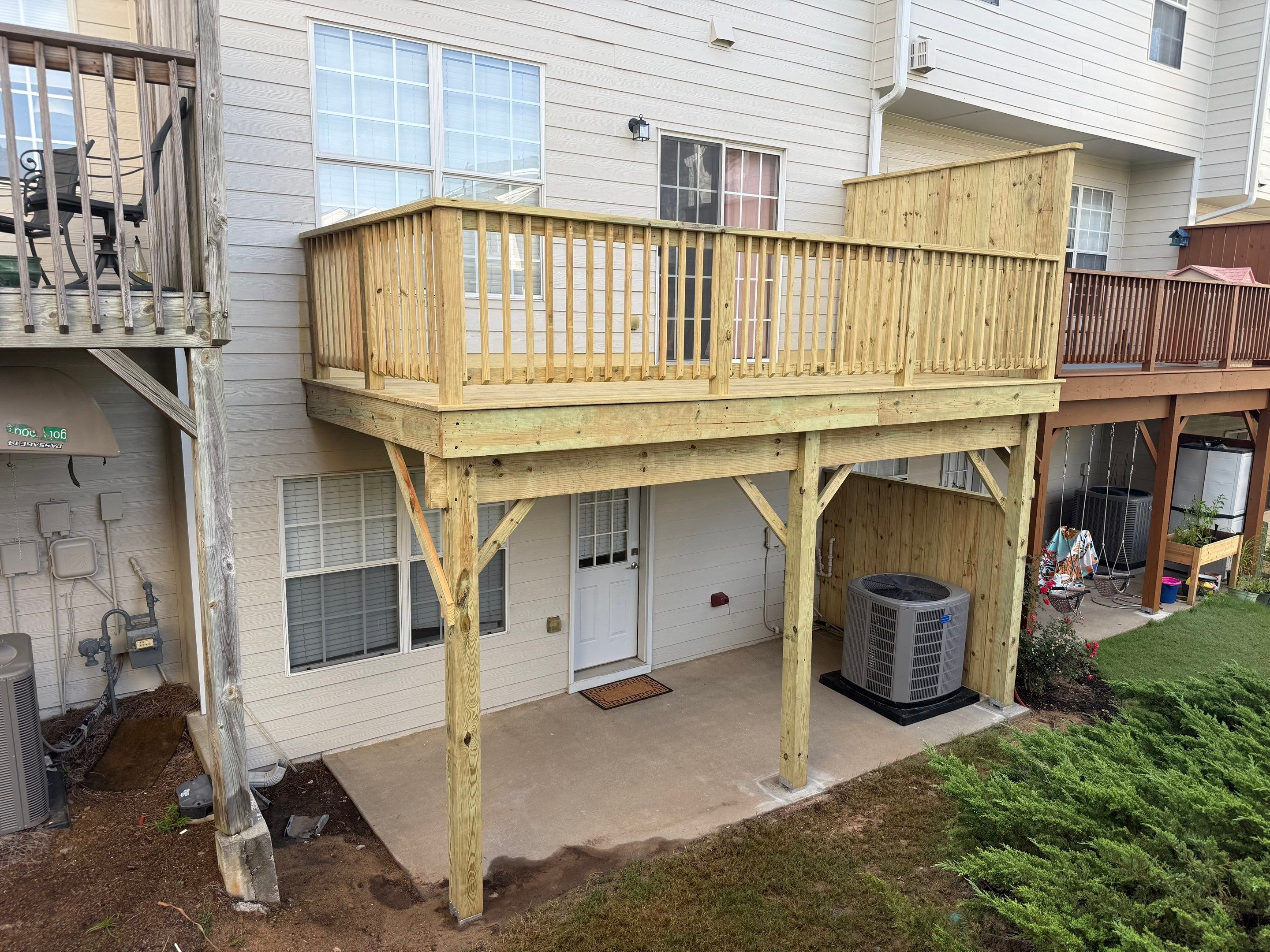 Elevated Pressure-Treated Wood Deck Replacement in Atlanta by Swift Home Renovations