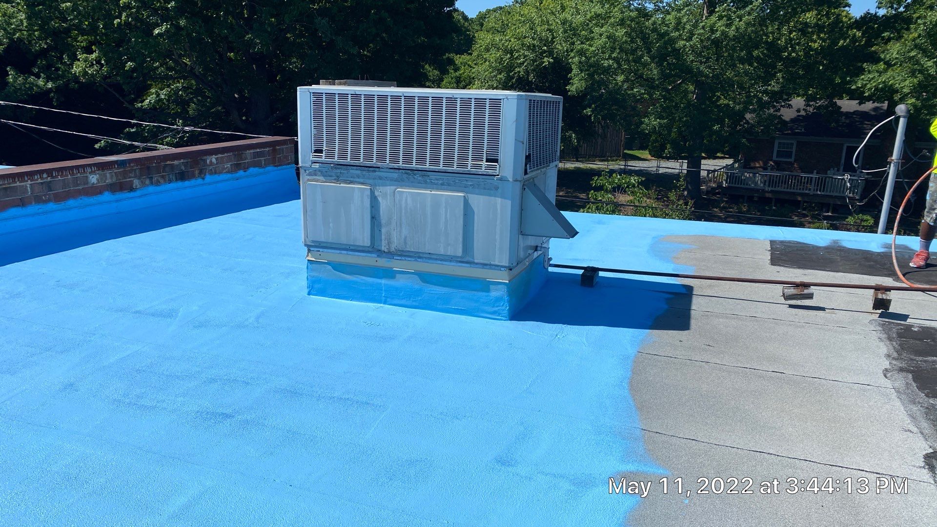 Commercial Roof Coating using Fiberseal basecoat and Silicon Topcoat by Just In Time Roofing and Restoration