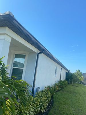 Black 7-Inch Gutters with Matching Downspouts in Lakewood Ranch FL by Gutter Professor