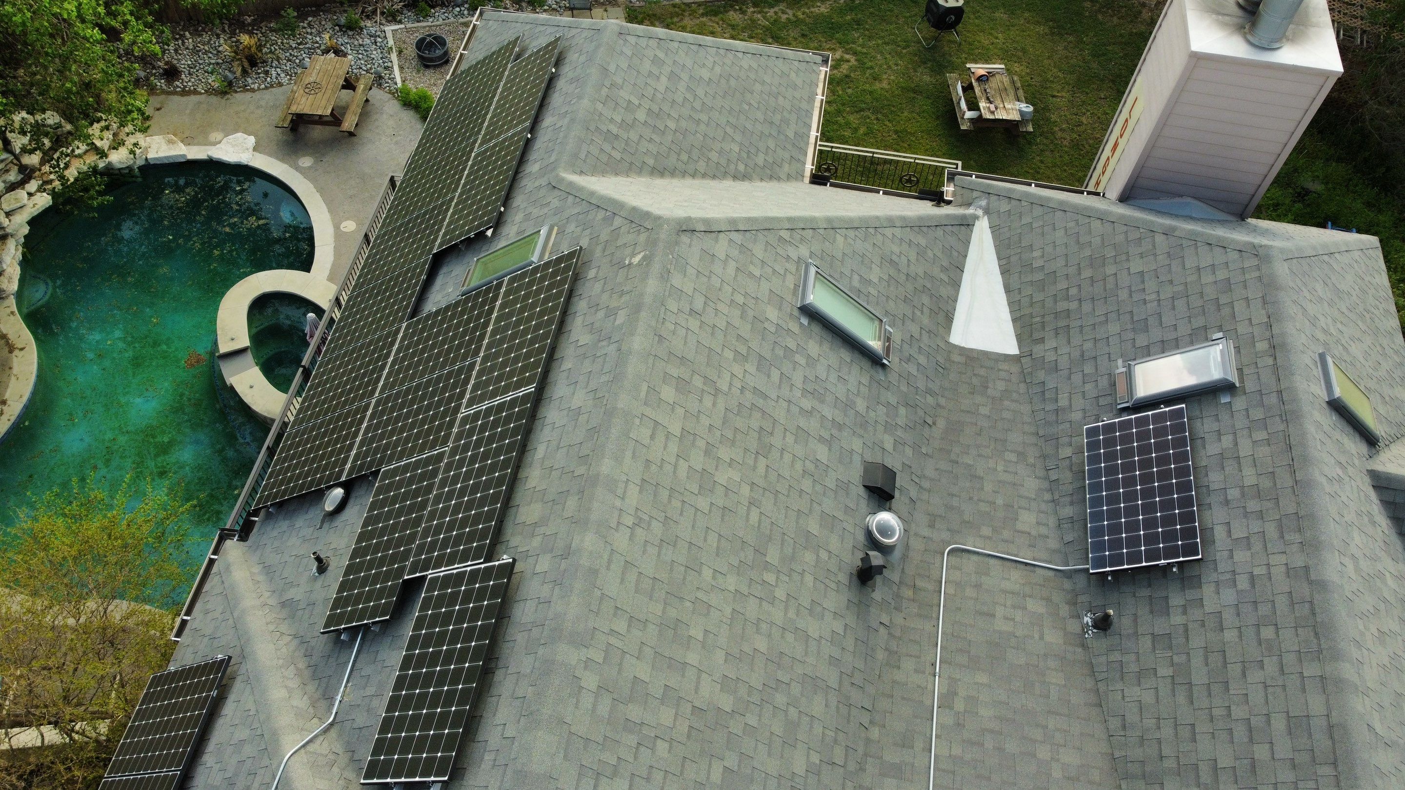 Residential Roof Replacement and Solar Panel Integration in Austin by Caliber Restoration LLC