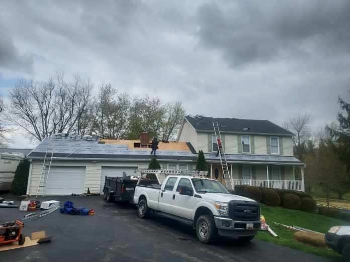 Residential Roofing Installation using Atlas Pinnacle Pristine Black Architectural Shingles by Frederick Roof Repair