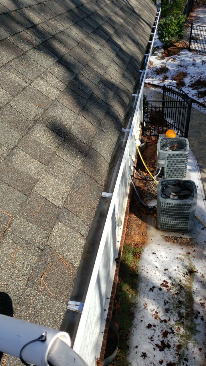 Gutter Cleaning using water by Power Wash Masters LLC