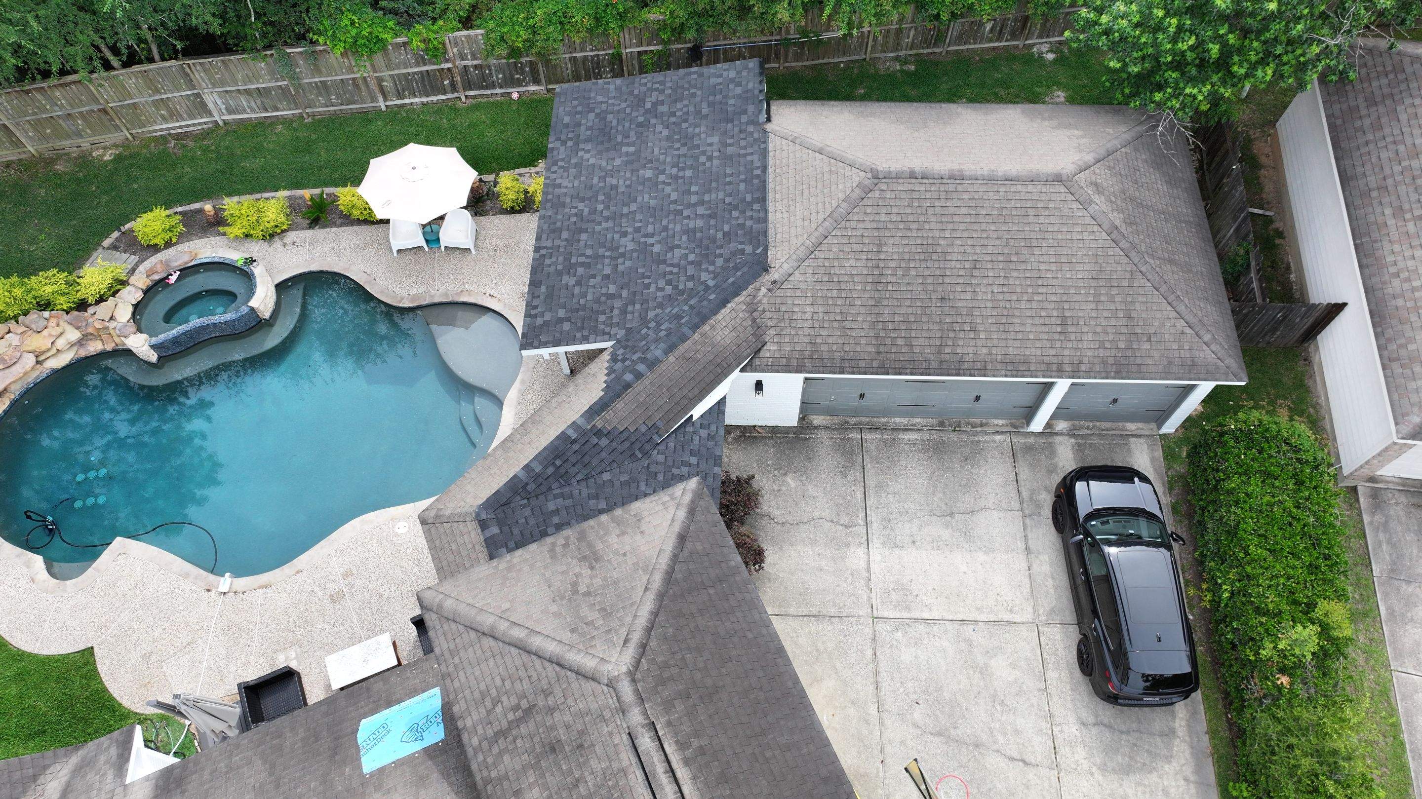 Roof Repair on Two-Story Estate Home — Spring, TX by PL Roofing & SB Roofing, LLC.