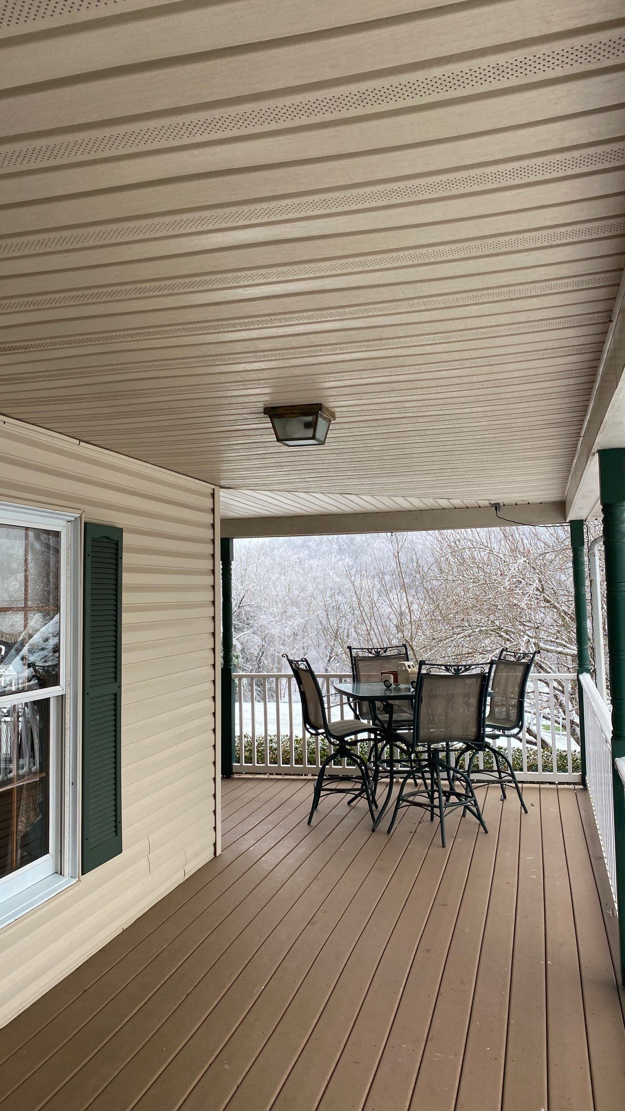 Exterior remodel including window replacement by American Home Contractors