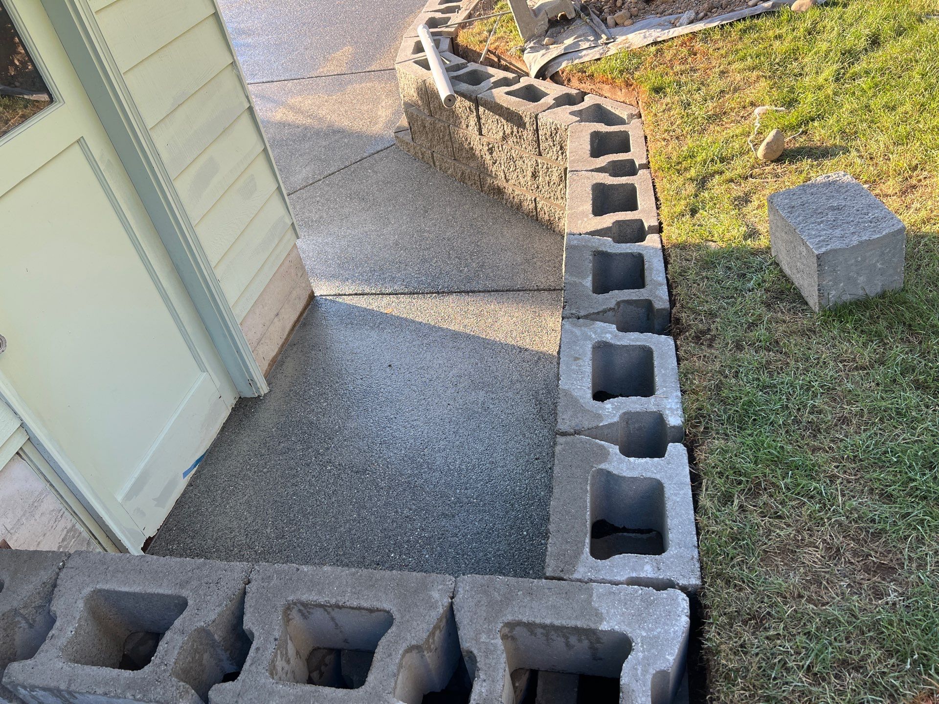 Concrete Patio & Driveway Renovation with Retaining Wall | Seattle  by Jireh Asphalt & Concrete Inc 