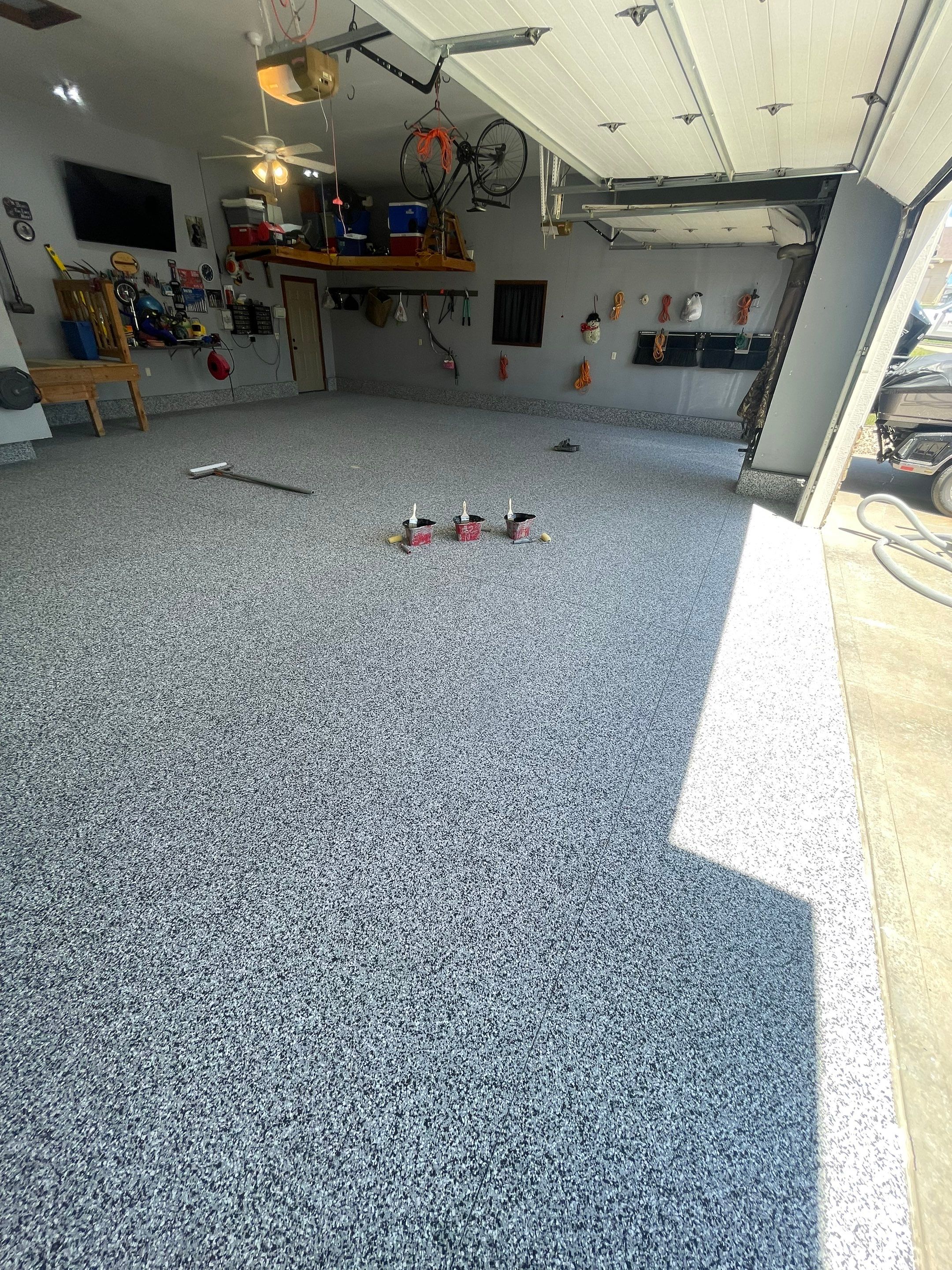Residential Garage Floor Coating in Sioux Falls by Select Painting, Coatings & Garage Cabinets