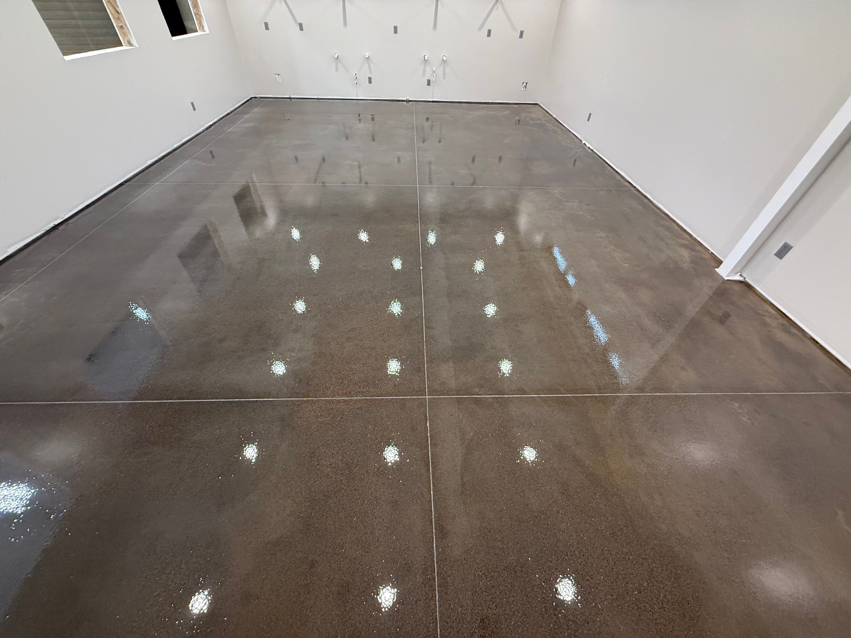 Industrial Concrete Polishing and Coating for Large Manufacturing Warehouse by Select Painting, Coatings & Garage Cabinets