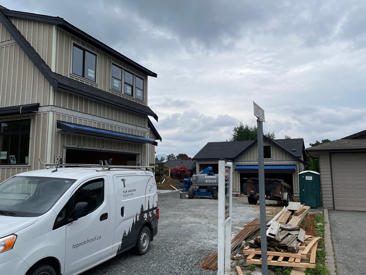 Residential Roofing Installation using Malarky Vista Midnight black by Top Notch Roofing Inc