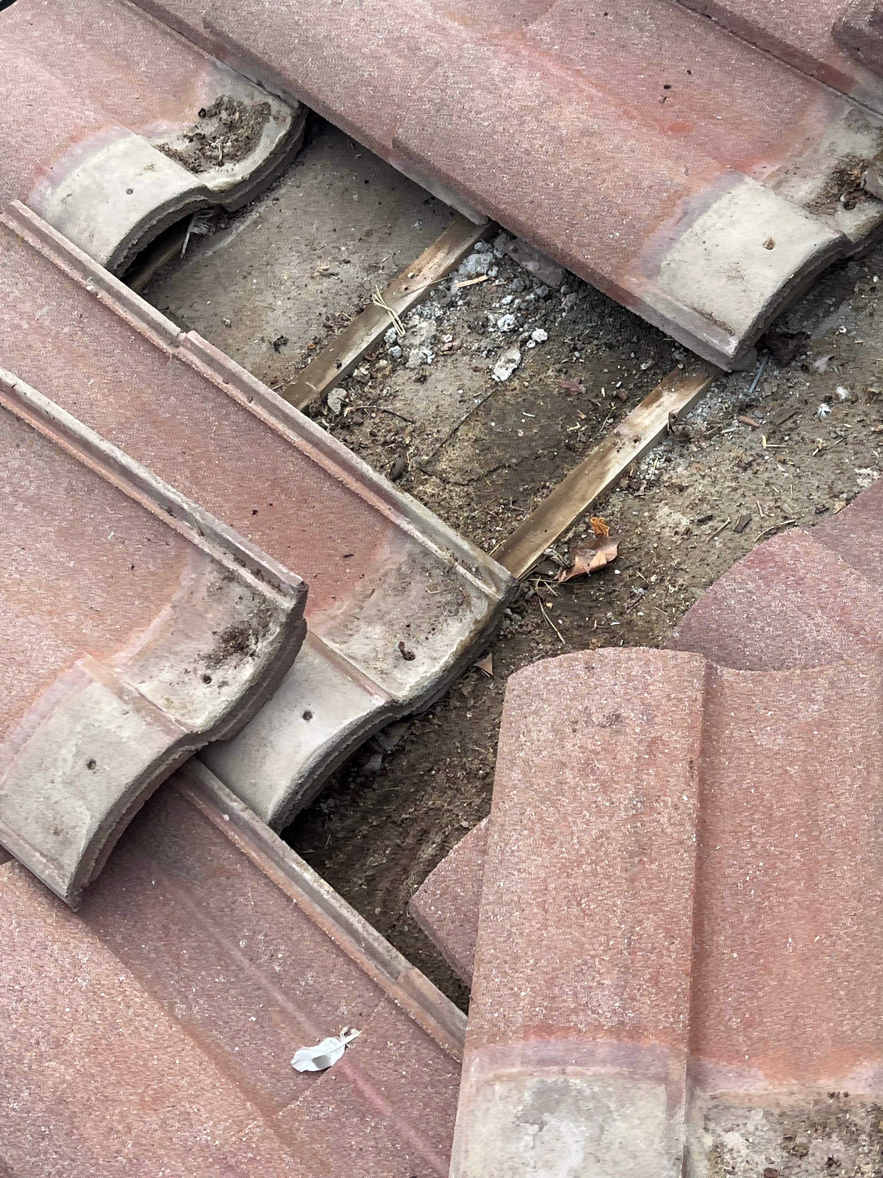 Tile Roofing Repair by Grandmark Service Company
