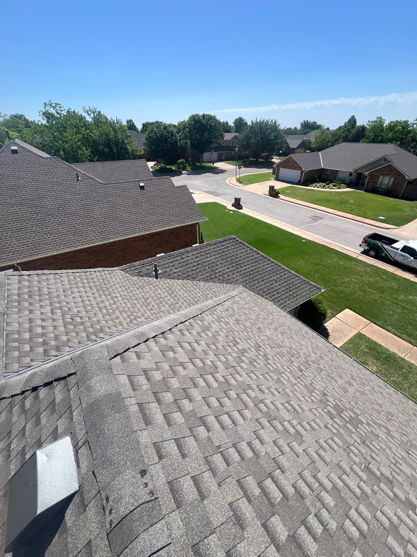 roof, vents & skylight replacement in Edmond by McCann's Roofing and Construction