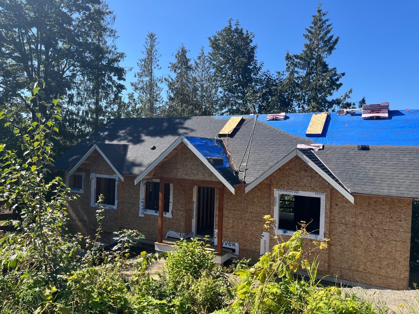 Residential Roofing Installation using OC Oakridge shingles by Top Notch Roofing Inc