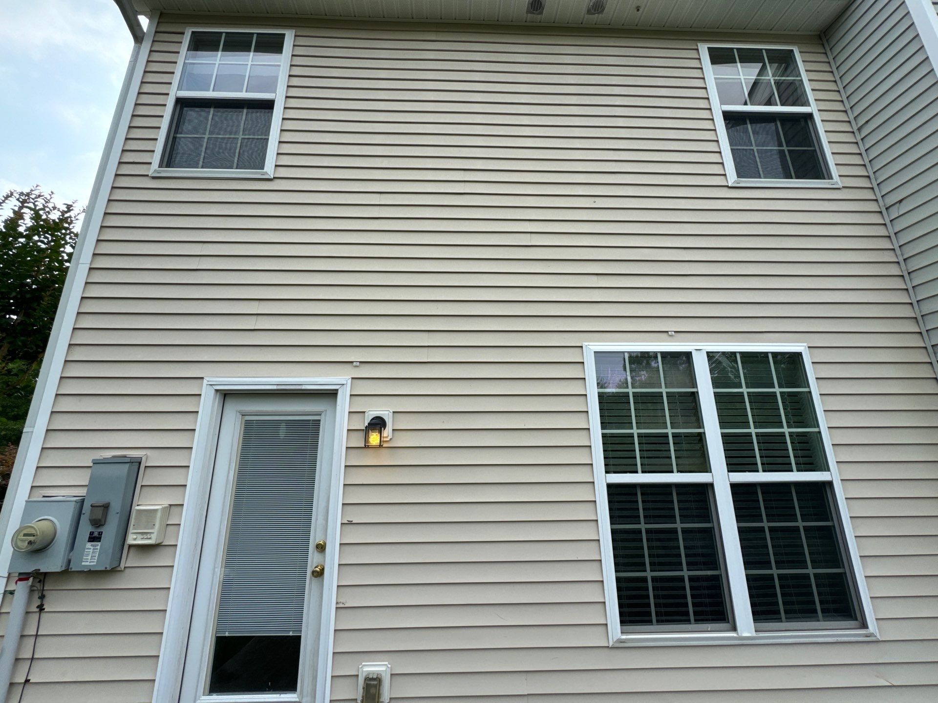 exterior house cleaning siding and windows pressure washing dirt removal maintenance