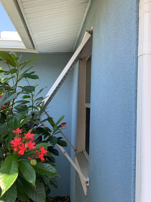 Hurricane Rated Bahama Shutters in Signal White