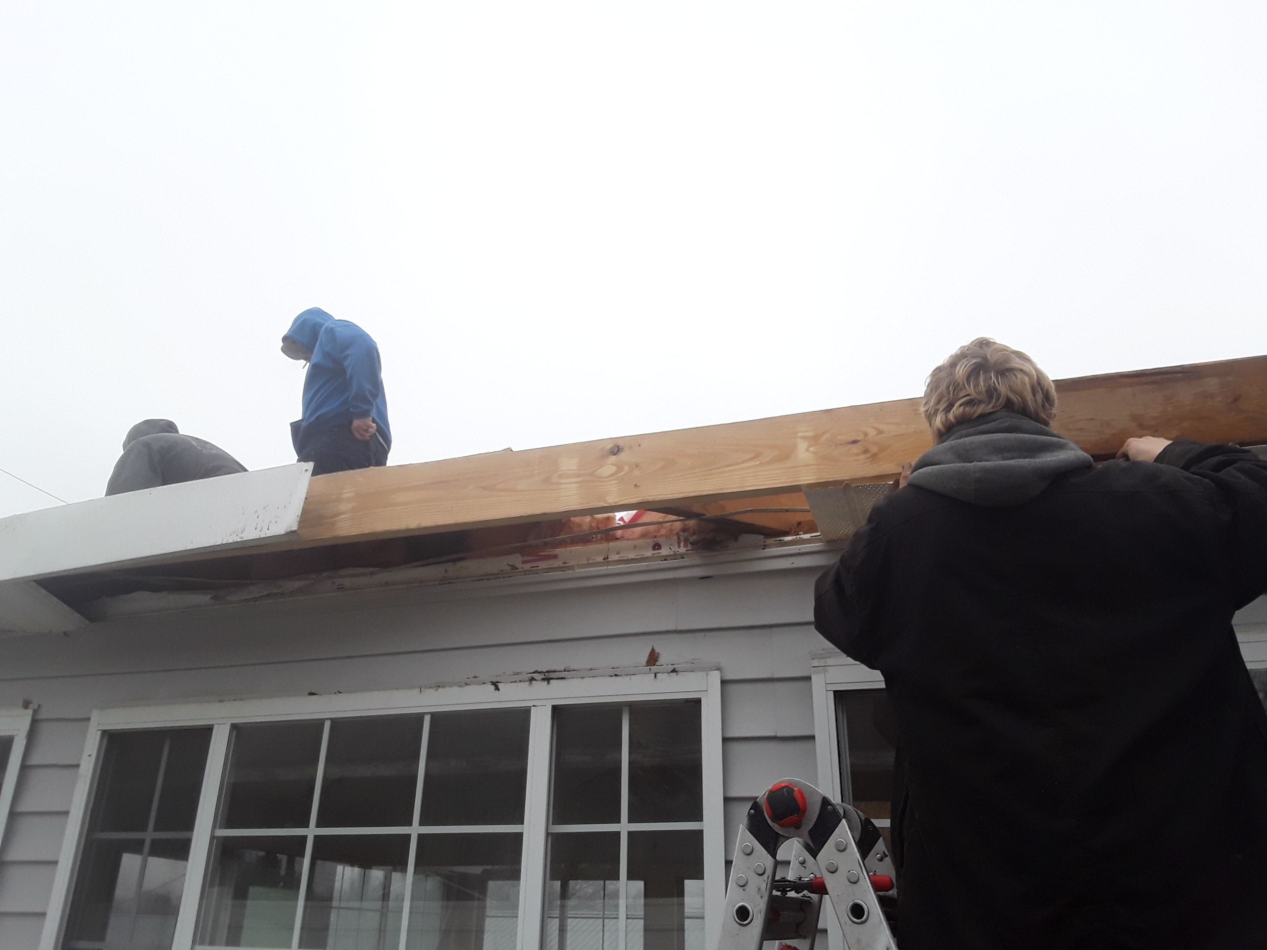 Rubber Roofing  on a residential sunroom by Secure Construction Company Inc
