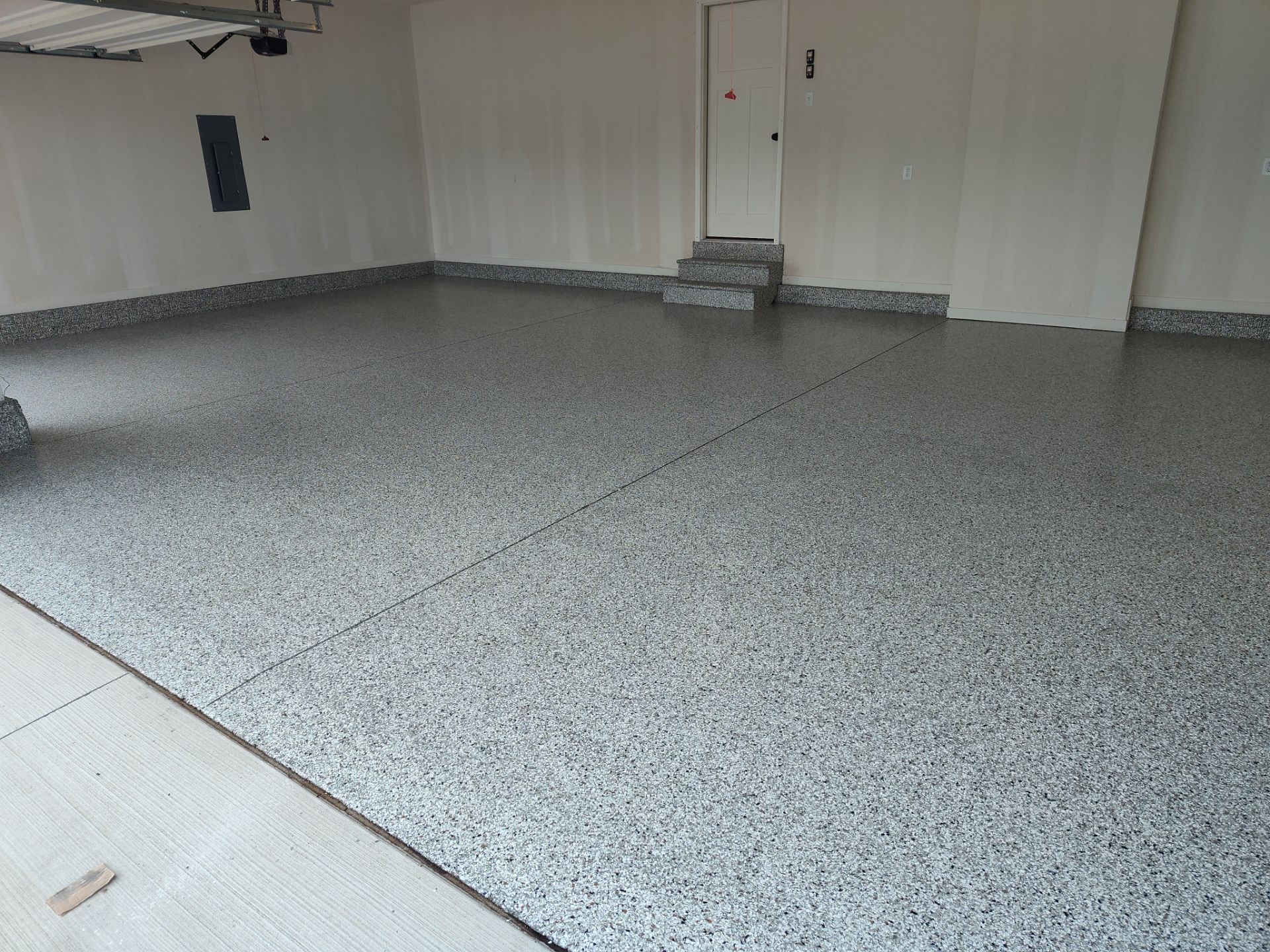 New Bondurant Garage Floor Coating by Revival Concrete Coatings, LLC