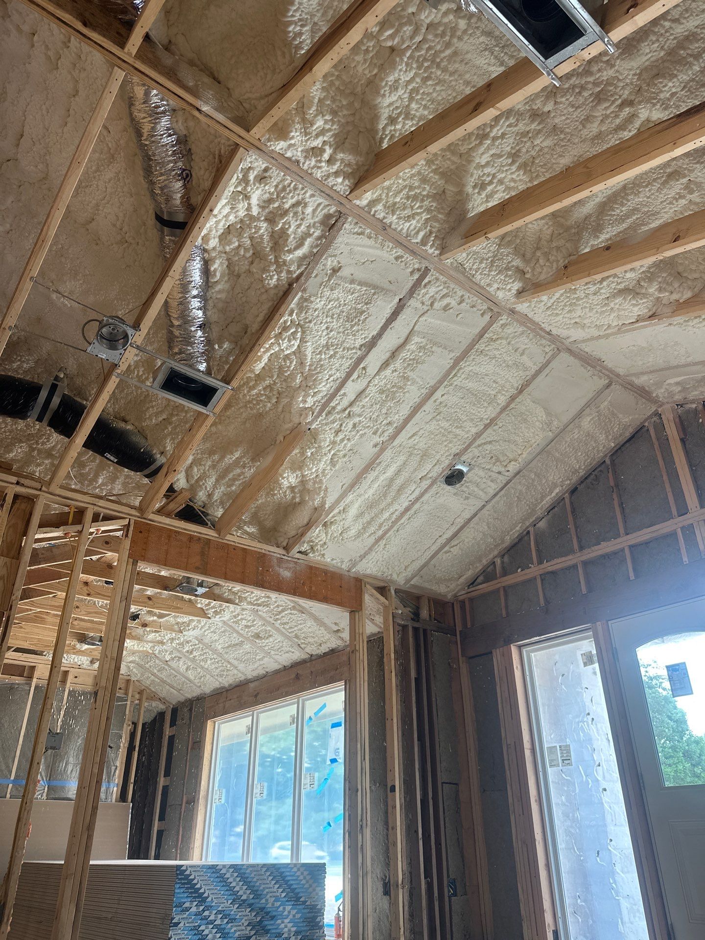 Open cell spray foam & rockwool job completed in Dallas TX by Apex Insulation Solutions
