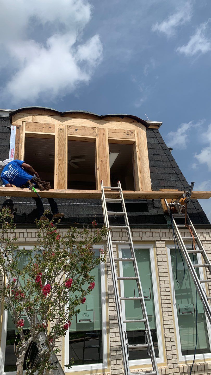 Mansard Charm by Bayfront Roofing and Construction