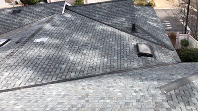 Attic Insulation, Roofing, and Solar for this in-town home