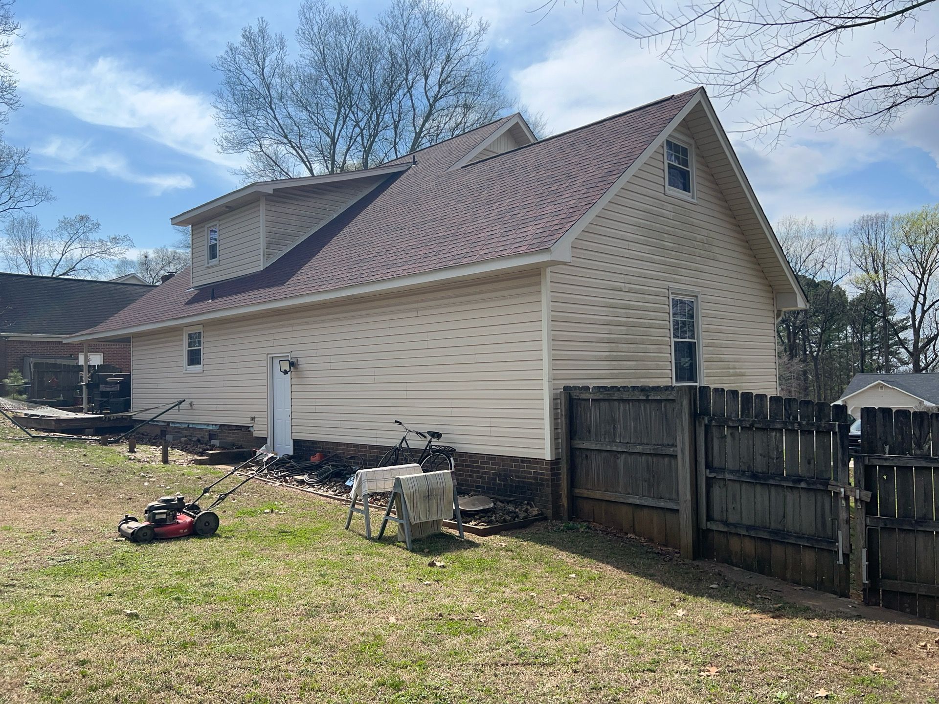 Siding Replacement using Mastic Carvedwood Vinyl Plank by Freedom Exteriors