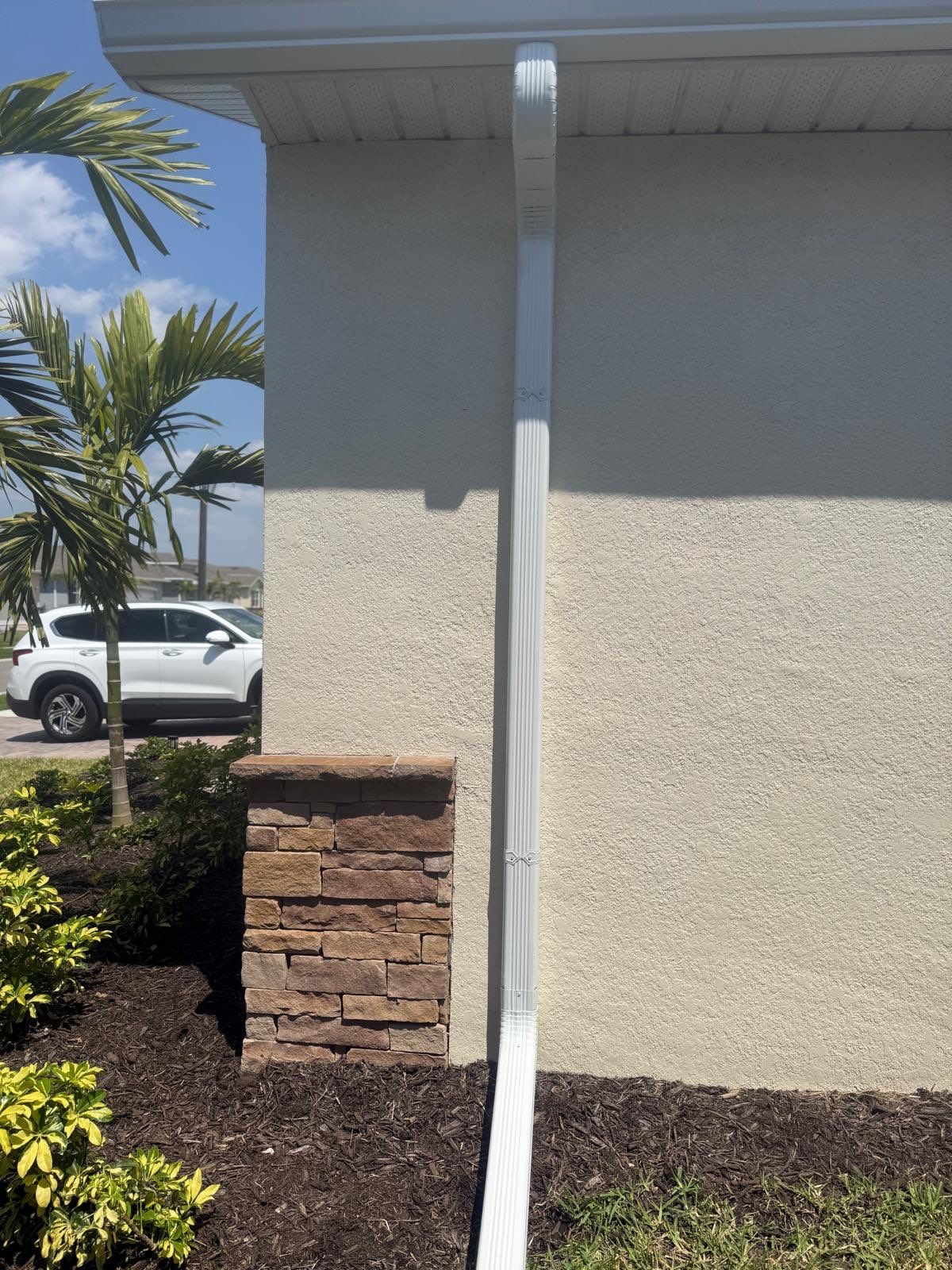 Aluminum Seamless Gutters using 3X4 Elbow Downspout in Cape Coral FL by Gutter Professors