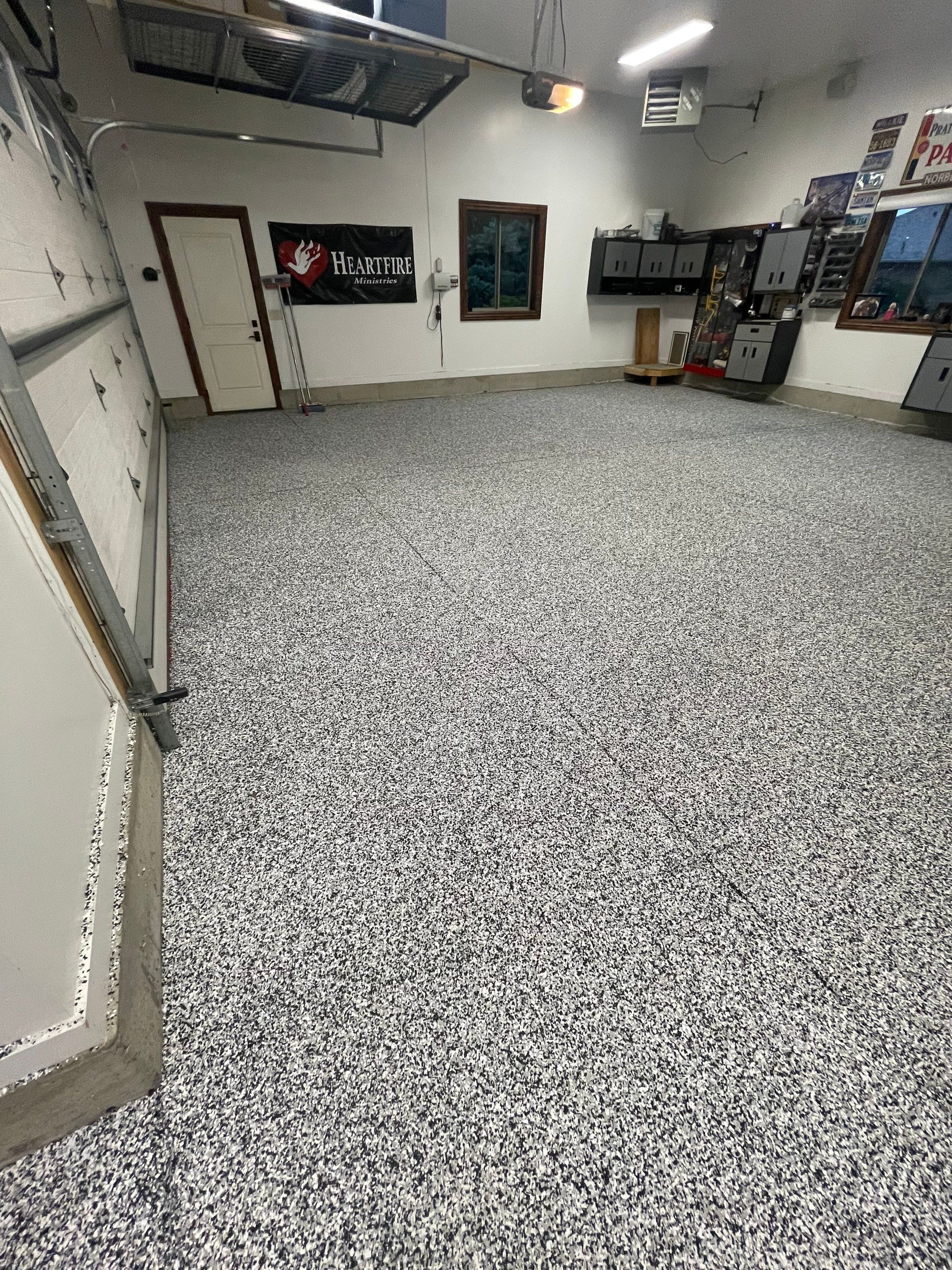 Garage Floor Coating and Domino Flake Finish in Sioux Falls by Select Painting, Coatings & Garage Cabinets
