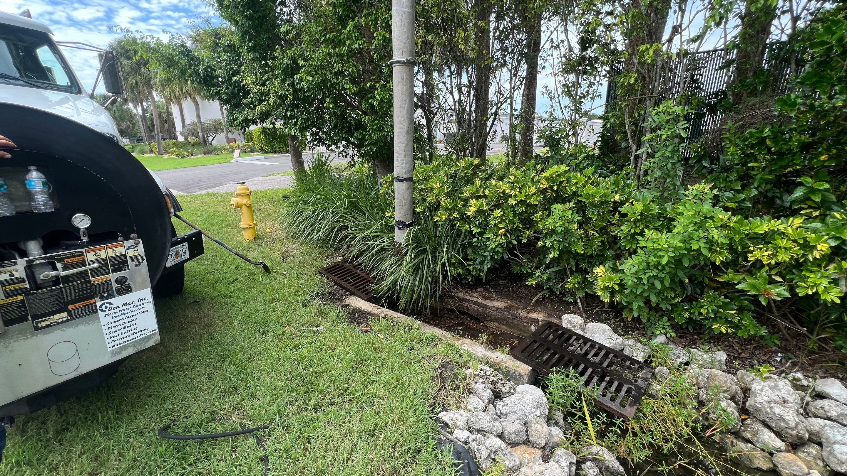 Naples Community Entry Road Stormwater System Cleaning by APS Power & Water