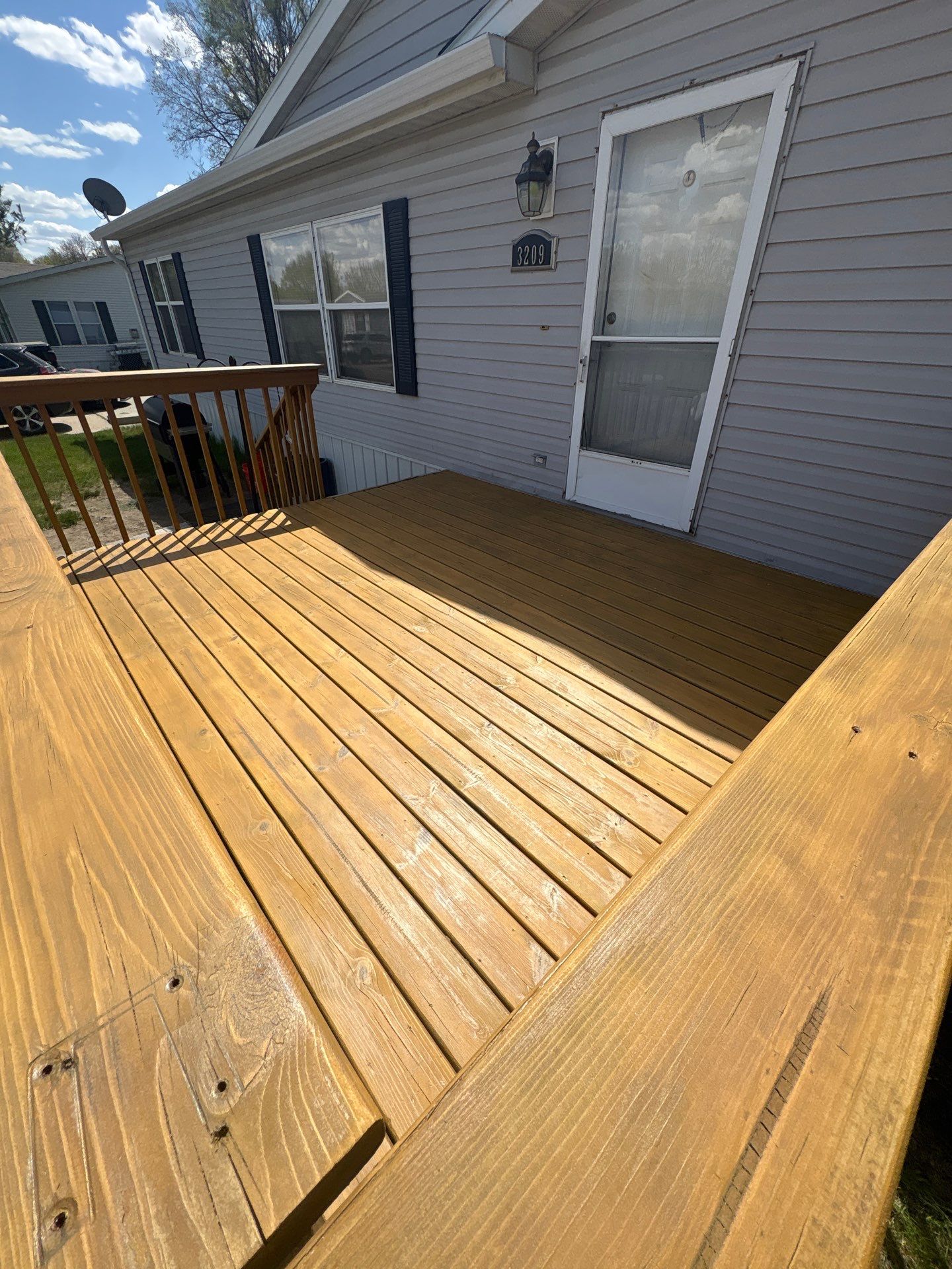 Wood Deck Staining and Interior Paint Refresh in Sioux Falls by Select Painting, Coatings & Garage Cabinets