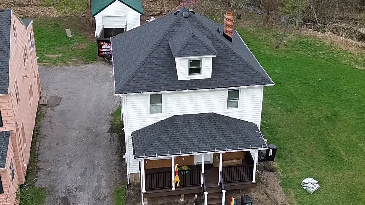 Roof replacement using owens corning roof system by Mike home improvements 