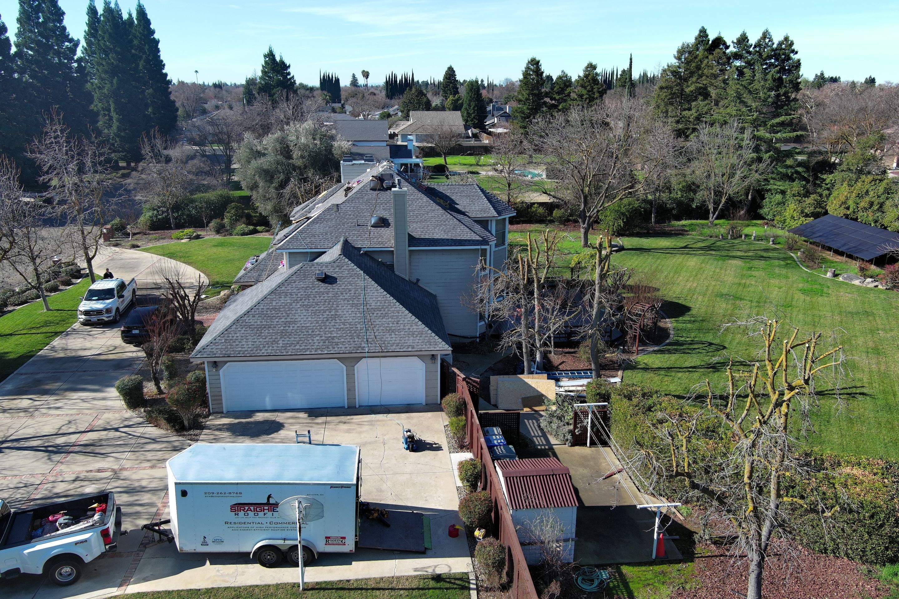 New shingles and gutters using GAF Timberline HDZ shingles and aluminum gutter by Straight Edge Roofing Inc