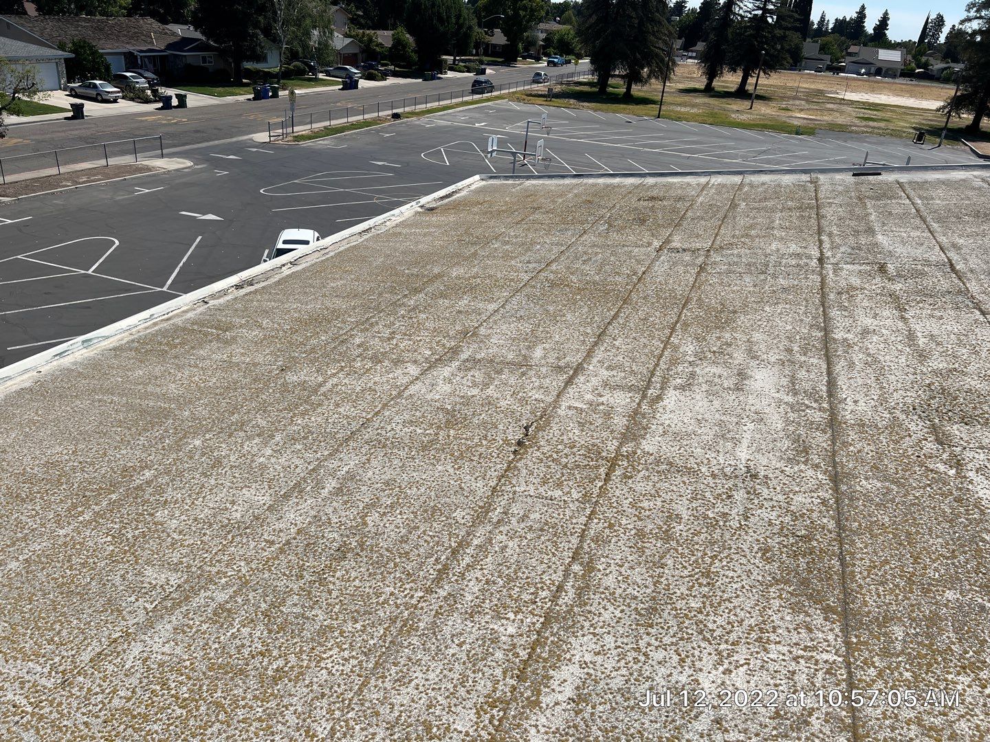 MR Roofing system using Benchmark/PUMA XL coatings over TPO single-ply roofing by Straight Edge Roofing Inc