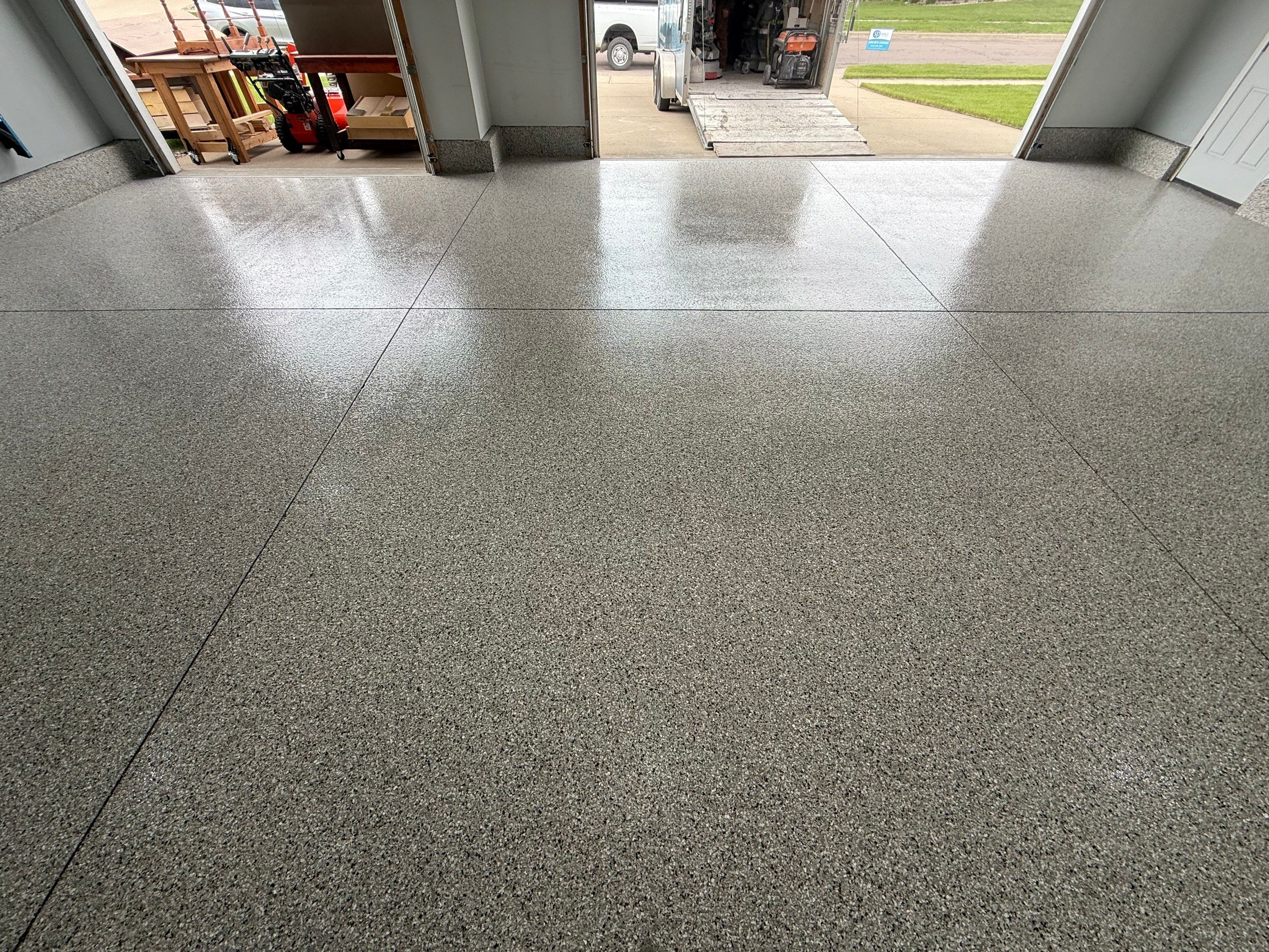 High-Gloss Epoxy Garage Floor Coating in Sioux Falls by Select Painting, Coatings & Garage Cabinets
