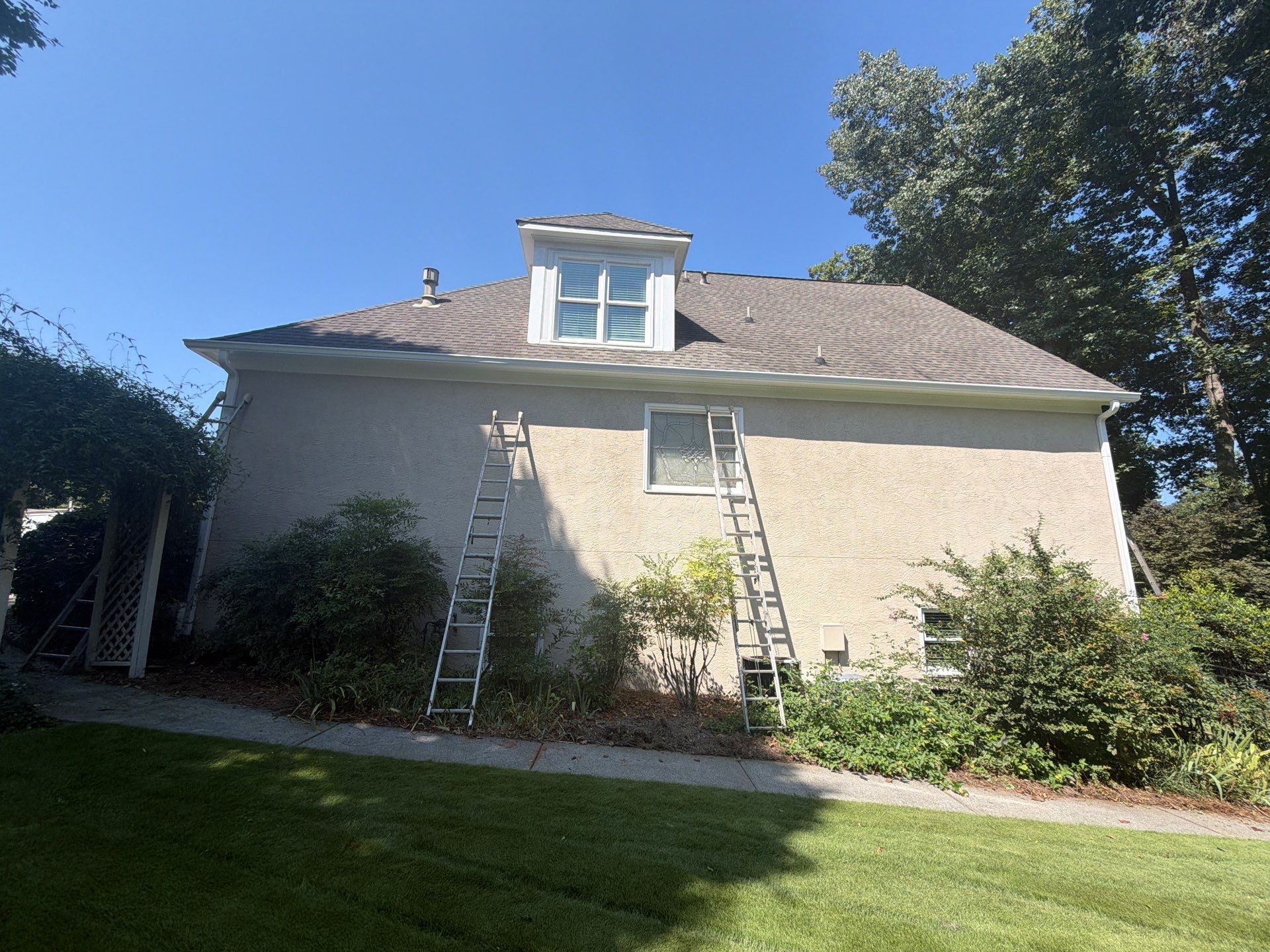 Multi-Story Stucco Home Exterior Painting and Garage Refresh in Marietta by Swift Home Renovations 