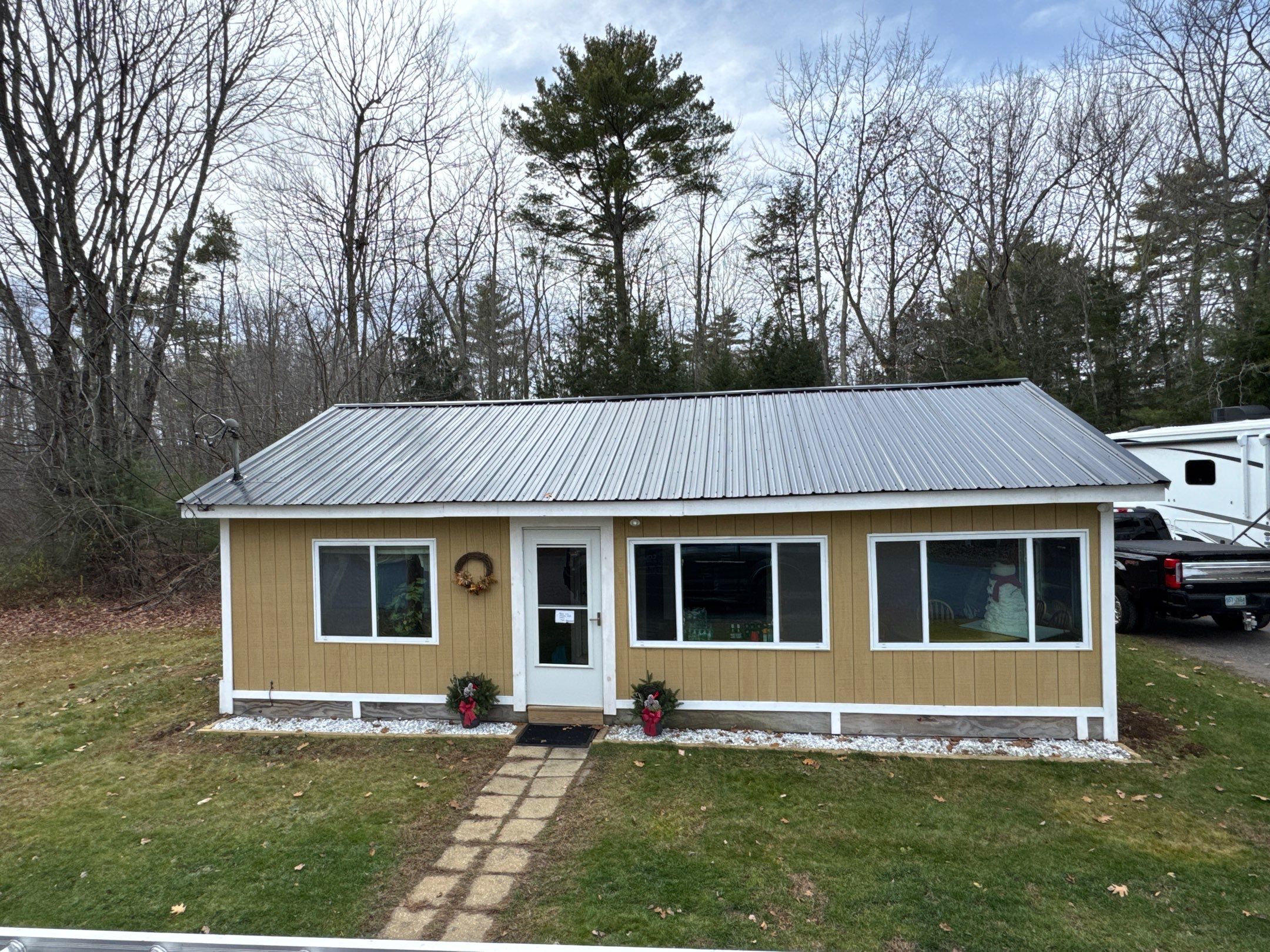 Gilford, NH Metal Roof Installation on Lake Winnipesaukee – Screw-Down Metal Roofing System by Compass exteriors