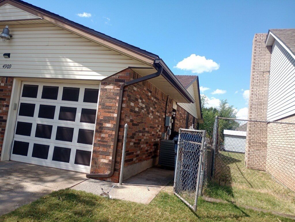 Roof Replacement and Gutter Installation in Oklahoma City, OK by McCann's Roofing and Construction