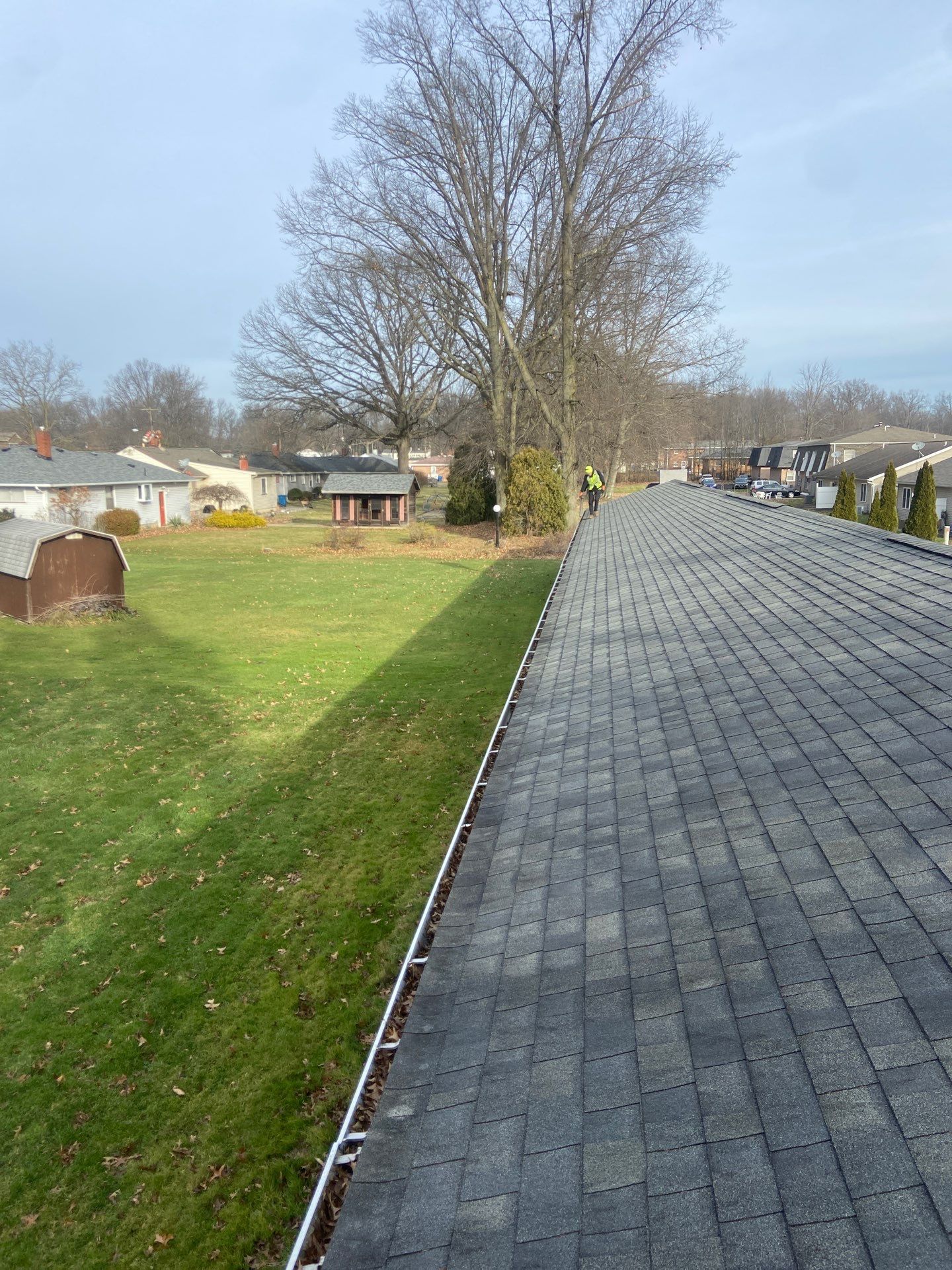 Commercial gutter cleaning Akron before photo with filled gutters