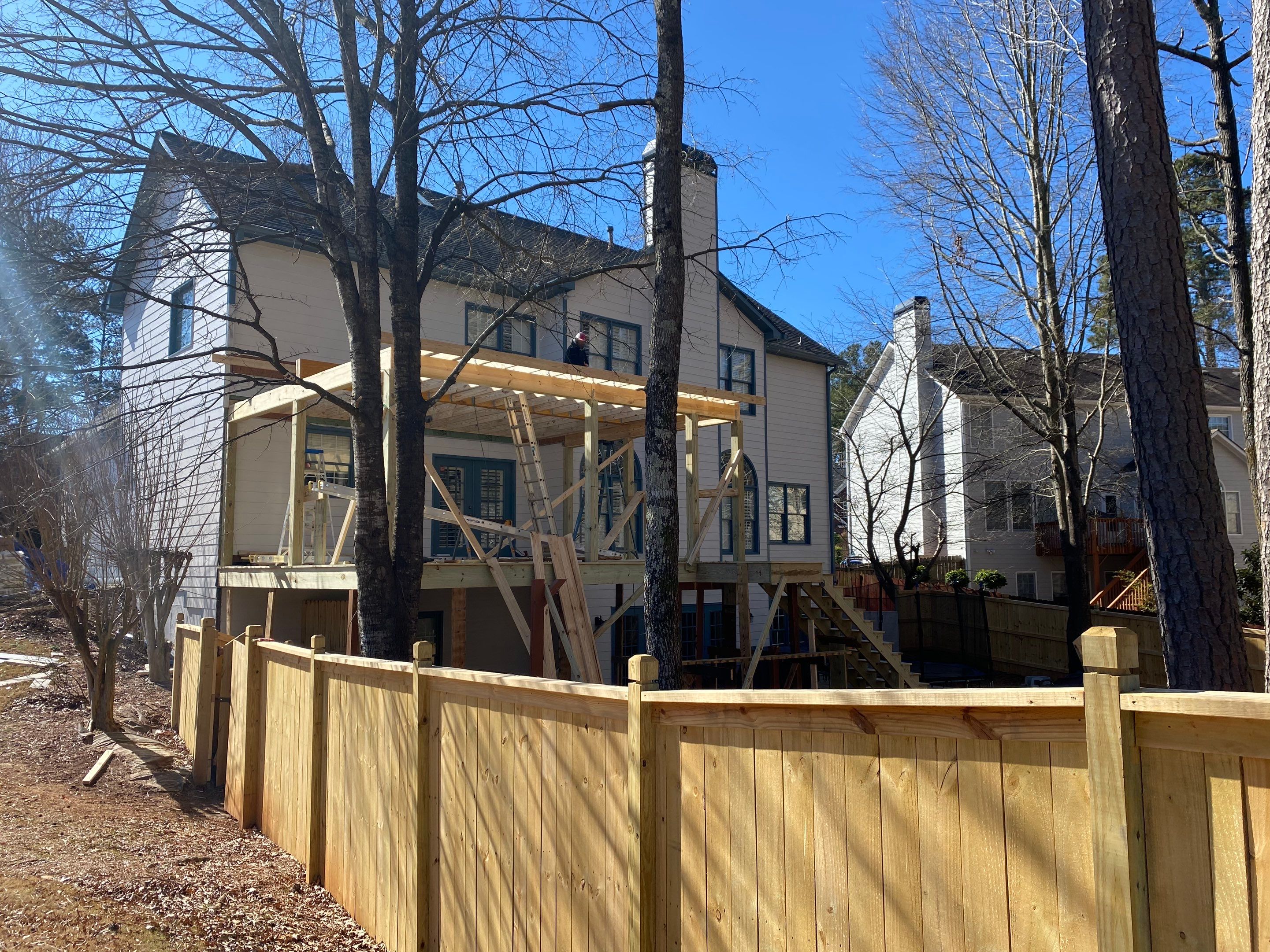 Covered Porch Addition and Custom Privacy Fence Installation in Alpharetta by Swift Home Renovations